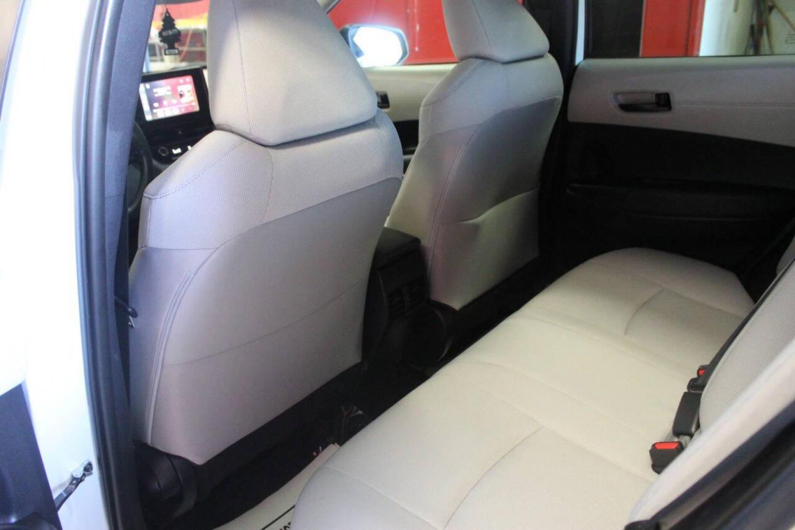 2023 White Toyota Corolla Cross L AWD (7MUAAAAG1PV) with an 2.0L L4 DOHC 16V engine, CVT transmission, located at 4301 NW 39th , Oklahoma City, OK, 73112, (405) 949-5600, 35.512135, -97.598671 - NO DRIVERS LICENCE NO-FULL COVERAGE INSURANCE-NO CREDIT CHECK. COME ON OVER TO SUPERSPORTS AND TAKE A LOOK AND TEST DRIVE. PLEASE GIVE US A CALL AT (405) 949-5600. NO LICENSIA DE MANEJAR- NO SEGURO DE COBERTURA TOTAL- NO VERIFICACCION DE CREDITO. POR FAVOR VENGAN A SUPERSPORTS, ECHE UN - Photo#14