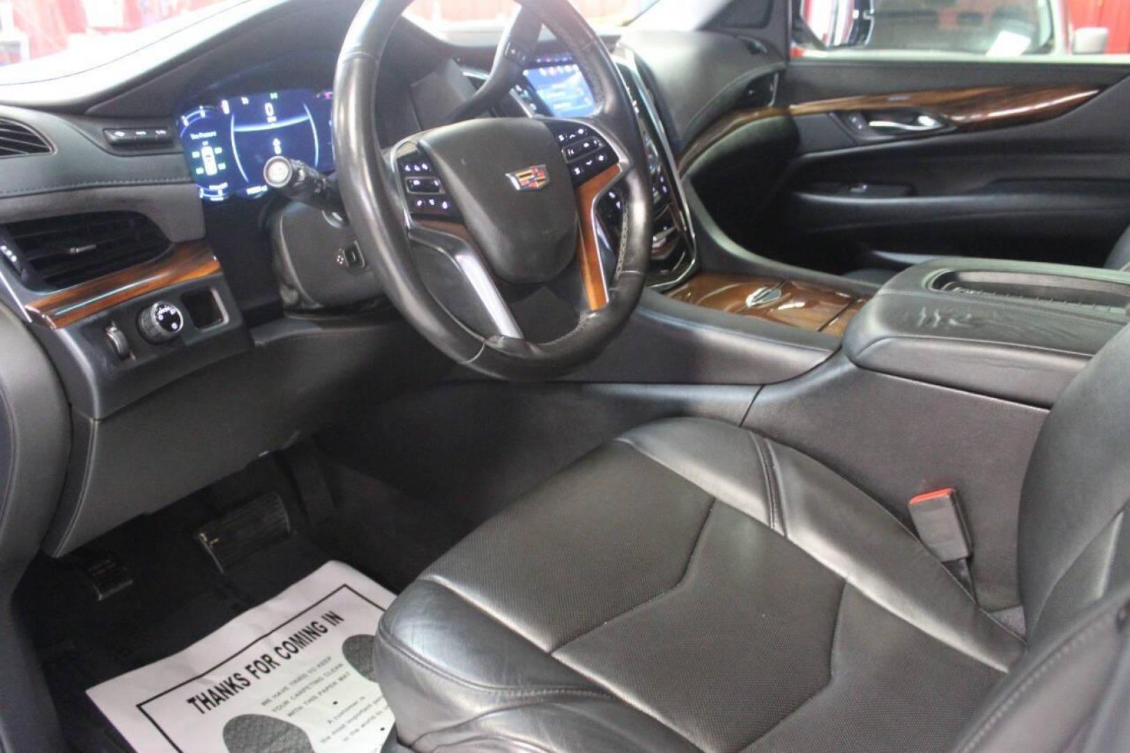 2016 Gray Cadillac Escalade Luxury 2WD (1GYS3BKJ0GR) with an 6.2L V8 OHV 16V FFV engine, 6A transmission, located at 4301 NW 39th , Oklahoma City, OK, 73112, (405) 949-5600, 35.512135, -97.598671 - NO DRIVERS LICENCE NO-FULL COVERAGE INSURANCE-NO CREDIT CHECK. COME ON OVER TO SUPERSPORTS AND TAKE A LOOK AND TEST DRIVE. PLEASE GIVE US A CALL AT (405) 949-5600. NO LICENSIA DE MANEJAR- NO SEGURO DE COBERTURA TOTAL- NO VERIFICACCION DE CREDITO. POR FAVOR VENGAN A SUPERSPORTS, ECHE UN - Photo#17