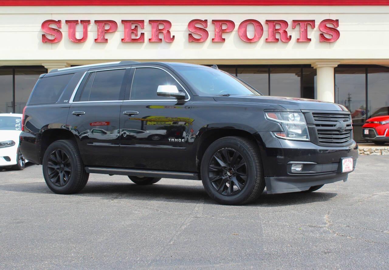 2015 Black Chevrolet Tahoe LTZ 4WD (1GNSKCKC9FR) with an 5.3L V8 5.3L V8 engine, Automatic 6-Speed transmission, located at 4301 NW 39th , Oklahoma City, OK, 73112, (405) 949-5600, 35.512135, -97.598671 - NO DRIVERS LICENCE NO-FULL COVERAGE INSURANCE-NO CREDIT CHECK. COME ON OVER TO SUPERSPORTS AND TAKE A LOOK AND TEST DRIVE. PLEASE GIVE US A CALL AT (405) 949-5600. NO LICENSIA DE MANEJAR- NO SEGURO DE COBERTURA TOTAL- NO VERIFICACCION DE CREDITO. POR FAVOR VENGAN A SUPERSPORTS, ECHE UN - Photo#0