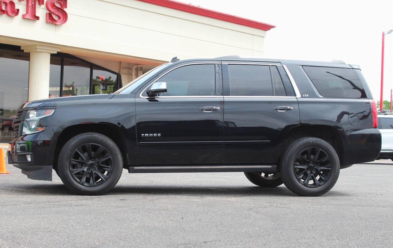 2015 Black Chevrolet Tahoe LTZ 4WD (1GNSKCKC9FR) with an 5.3L V8 5.3L V8 engine, Automatic 6-Speed transmission, located at 4301 NW 39th , Oklahoma City, OK, 73112, (405) 949-5600, 35.512135, -97.598671 - NO DRIVERS LICENCE NO-FULL COVERAGE INSURANCE-NO CREDIT CHECK. COME ON OVER TO SUPERSPORTS AND TAKE A LOOK AND TEST DRIVE. PLEASE GIVE US A CALL AT (405) 949-5600. NO LICENSIA DE MANEJAR- NO SEGURO DE COBERTURA TOTAL- NO VERIFICACCION DE CREDITO. POR FAVOR VENGAN A SUPERSPORTS, ECHE UN - Photo#6