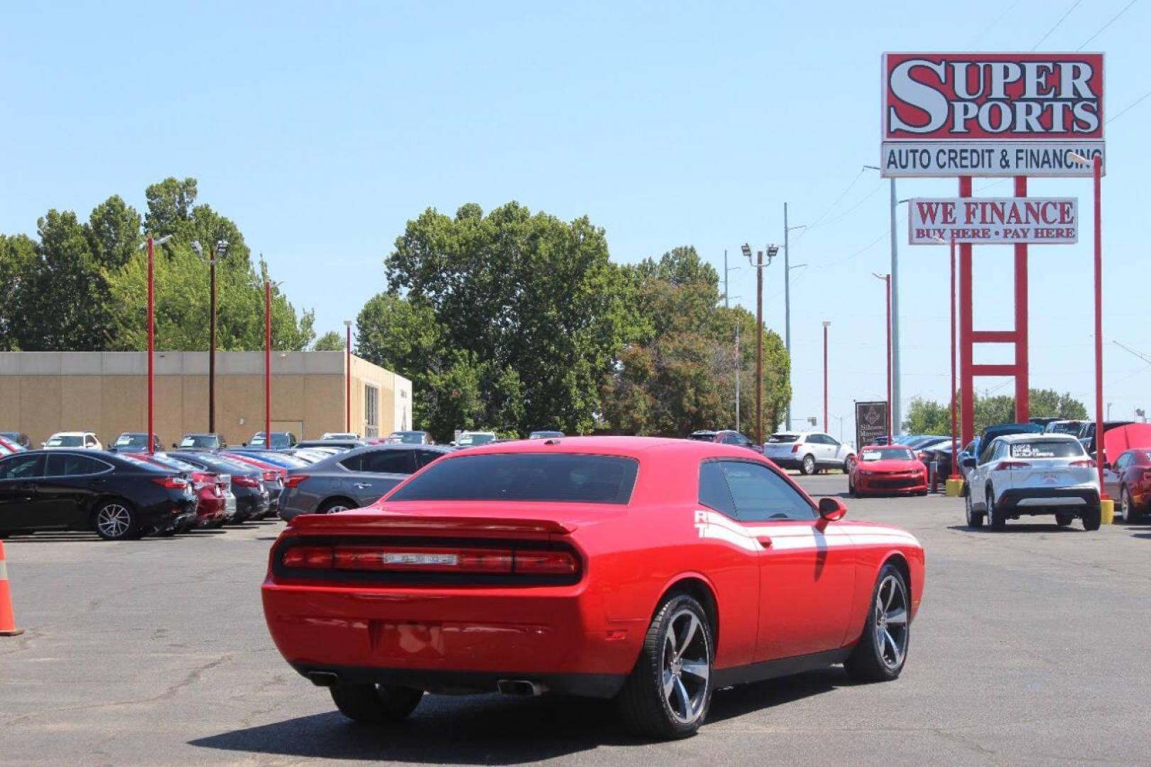 2014 Red Dodge Challenger R/T (2C3CDYBT1EH) with an 5.7L V8 OHV 16V engine, Automatic 5-Speed transmission, located at 4301 NW 39th , Oklahoma City, OK, 73112, (405) 949-5600, 35.512135, -97.598671 - NO DRIVERS LICENCE NO-FULL COVERAGE INSURANCE-NO CREDIT CHECK. COME ON OVER TO SUPERSPORTS AND TAKE A LOOK AND TEST DRIVE. PLEASE GIVE US A CALL AT (405) 949-5600. NO LICENSIA DE MANEJAR- NO SEGURO DE COBERTURA TOTAL- NO VERIFICACCION DE CREDITO. POR FAVOR VENGAN A SUPERSPORTS, ECHE UN - Photo#4