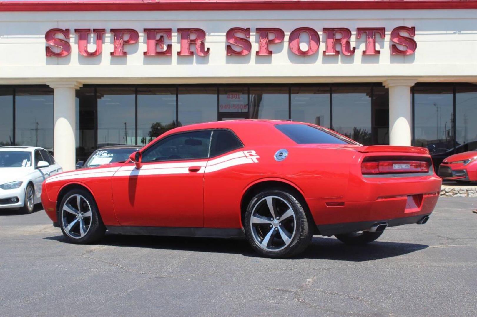 2014 Red Dodge Challenger R/T (2C3CDYBT1EH) with an 5.7L V8 OHV 16V engine, Automatic 5-Speed transmission, located at 4301 NW 39th , Oklahoma City, OK, 73112, (405) 949-5600, 35.512135, -97.598671 - NO DRIVERS LICENCE NO-FULL COVERAGE INSURANCE-NO CREDIT CHECK. COME ON OVER TO SUPERSPORTS AND TAKE A LOOK AND TEST DRIVE. PLEASE GIVE US A CALL AT (405) 949-5600. NO LICENSIA DE MANEJAR- NO SEGURO DE COBERTURA TOTAL- NO VERIFICACCION DE CREDITO. POR FAVOR VENGAN A SUPERSPORTS, ECHE UN - Photo#5