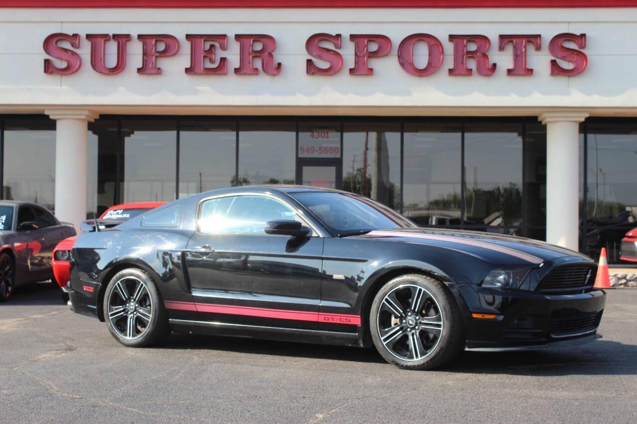 2013 Black Ford Mustang GT Coupe (1ZVBP8CF1D5) with an 5.0L V8 5.0L V8 engine, Manual 6-Speed transmission, located at 4301 NW 39th , Oklahoma City, OK, 73112, (405) 949-5600, 35.512135, -97.598671 - NO DRIVERS LICENCE NO-FULL COVERAGE INSURANCE-NO CREDIT CHECK. COME ON OVER TO SUPERSPORTS AND TAKE A LOOK AND TEST DRIVE. PLEASE GIVE US A CALL AT (405) 949-5600. NO LICENSIA DE MANEJAR- NO SEGURO DE COBERTURA TOTAL- NO VERIFICACCION DE CREDITO. POR FAVOR VENGAN A SUPERSPORTS, ECHE UN - Photo#0