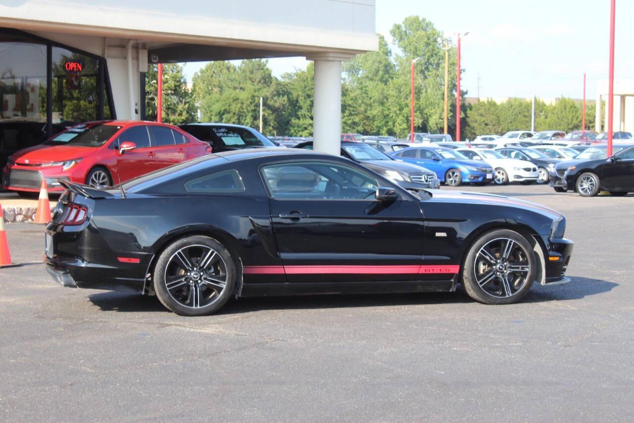 2013 Black Ford Mustang GT Coupe (1ZVBP8CF1D5) with an 5.0L V8 5.0L V8 engine, Manual 6-Speed transmission, located at 4301 NW 39th , Oklahoma City, OK, 73112, (405) 949-5600, 35.512135, -97.598671 - NO DRIVERS LICENCE NO-FULL COVERAGE INSURANCE-NO CREDIT CHECK. COME ON OVER TO SUPERSPORTS AND TAKE A LOOK AND TEST DRIVE. PLEASE GIVE US A CALL AT (405) 949-5600. NO LICENSIA DE MANEJAR- NO SEGURO DE COBERTURA TOTAL- NO VERIFICACCION DE CREDITO. POR FAVOR VENGAN A SUPERSPORTS, ECHE UN - Photo#2