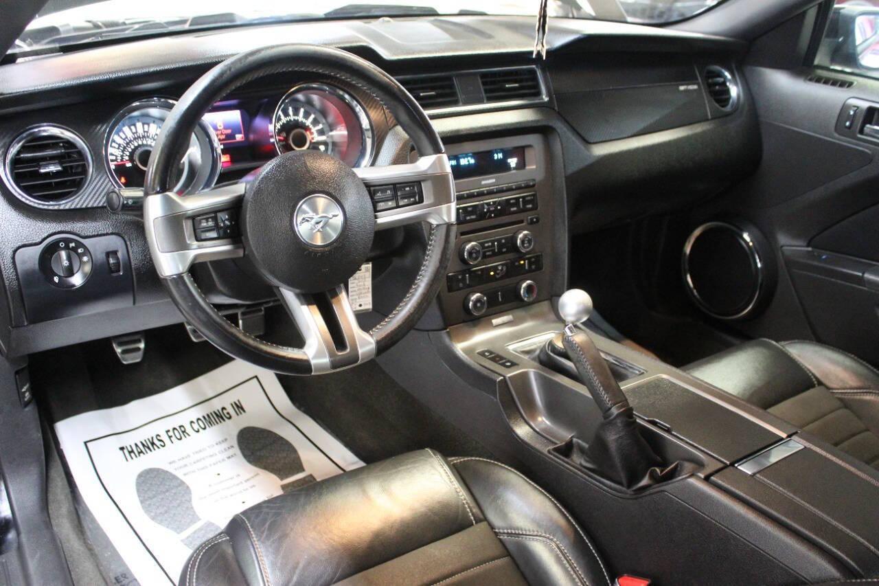 2013 Black Ford Mustang GT Coupe (1ZVBP8CF1D5) with an 5.0L V8 5.0L V8 engine, Manual 6-Speed transmission, located at 4301 NW 39th , Oklahoma City, OK, 73112, (405) 949-5600, 35.512135, -97.598671 - NO DRIVERS LICENCE NO-FULL COVERAGE INSURANCE-NO CREDIT CHECK. COME ON OVER TO SUPERSPORTS AND TAKE A LOOK AND TEST DRIVE. PLEASE GIVE US A CALL AT (405) 949-5600. NO LICENSIA DE MANEJAR- NO SEGURO DE COBERTURA TOTAL- NO VERIFICACCION DE CREDITO. POR FAVOR VENGAN A SUPERSPORTS, ECHE UN - Photo#12