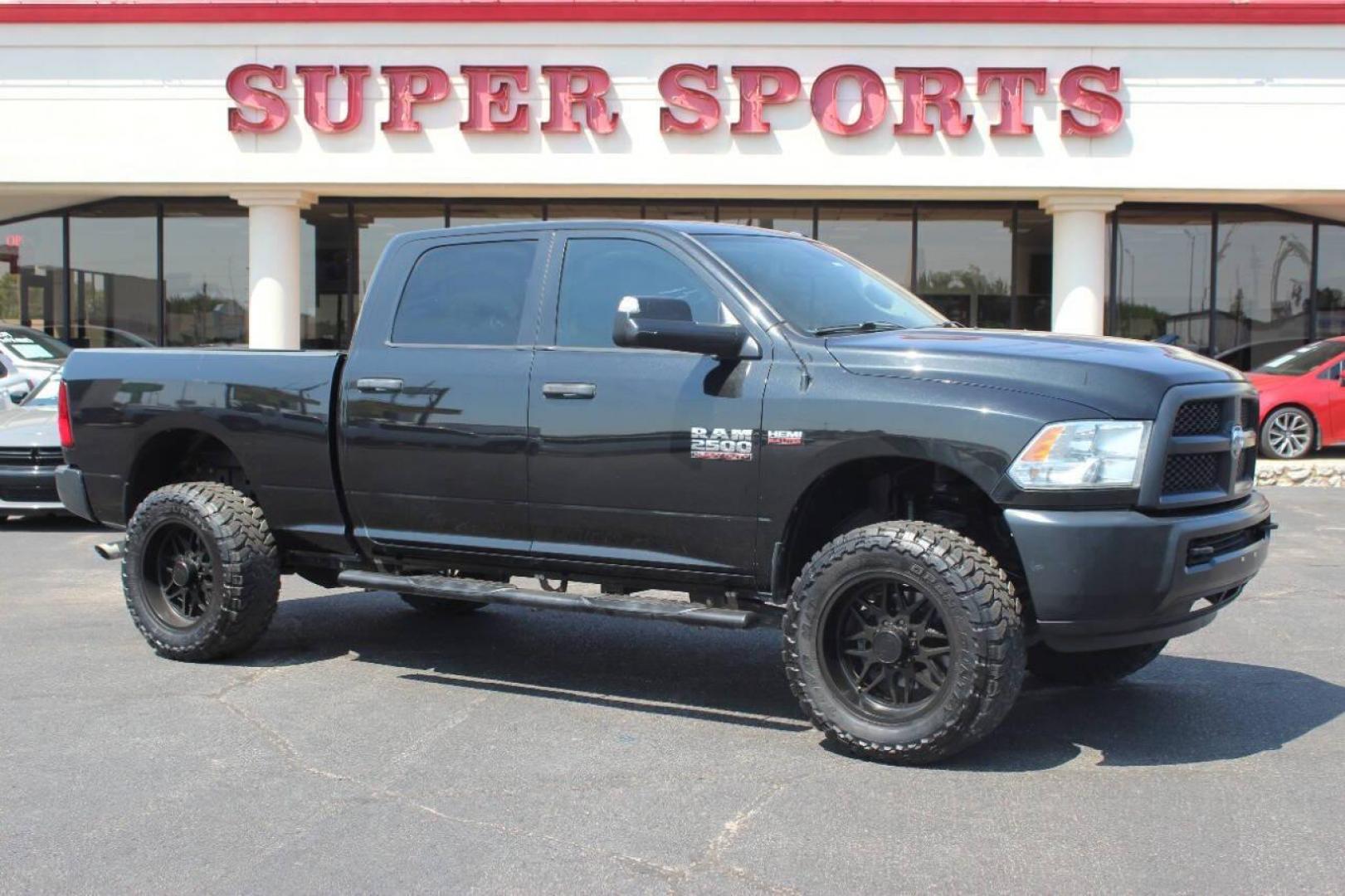 2017 Black RAM 2500 Tradesman Crew Cab SWB 4WD (3C6UR5CJ0HG) with an 6.4L V8 engine, 6A transmission, located at 4301 NW 39th , Oklahoma City, OK, 73112, (405) 949-5600, 35.512135, -97.598671 - NO DRIVERS LICENCE NO-FULL COVERAGE INSURANCE-NO CREDIT CHECK. COME ON OVER TO SUPERSPORTS AND TAKE A LOOK AND TEST DRIVE. PLEASE GIVE US A CALL AT (405) 949-5600. NO LICENSIA DE MANEJAR- NO SEGURO DE COBERTURA TOTAL- NO VERIFICACCION DE CREDITO. POR FAVOR VENGAN A SUPERSPORTS, ECHE UN - Photo#2