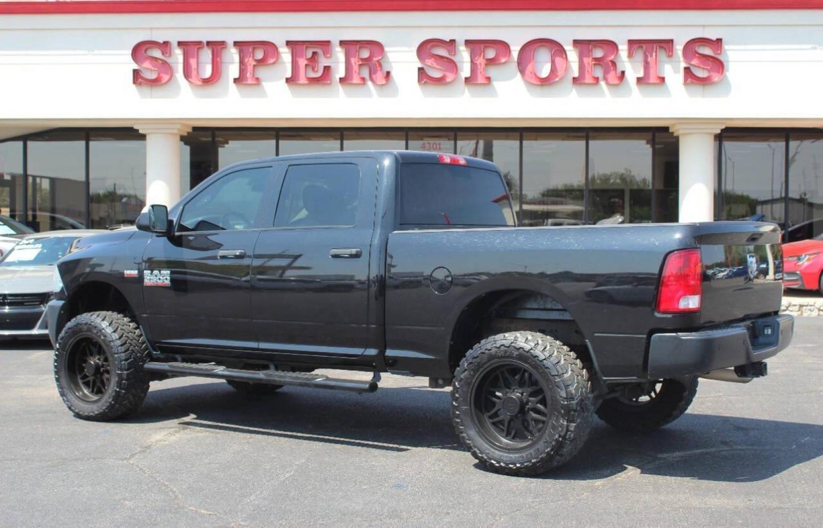 2017 Black RAM 2500 Tradesman Crew Cab SWB 4WD (3C6UR5CJ0HG) with an 6.4L V8 engine, 6A transmission, located at 4301 NW 39th , Oklahoma City, OK, 73112, (405) 949-5600, 35.512135, -97.598671 - NO DRIVERS LICENCE NO-FULL COVERAGE INSURANCE-NO CREDIT CHECK. COME ON OVER TO SUPERSPORTS AND TAKE A LOOK AND TEST DRIVE. PLEASE GIVE US A CALL AT (405) 949-5600. NO LICENSIA DE MANEJAR- NO SEGURO DE COBERTURA TOTAL- NO VERIFICACCION DE CREDITO. POR FAVOR VENGAN A SUPERSPORTS, ECHE UN - Photo#5