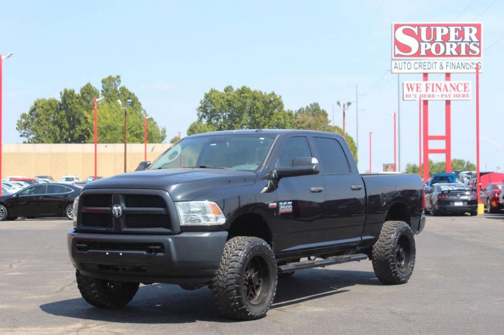 2017 Black RAM 2500 Tradesman Crew Cab SWB 4WD (3C6UR5CJ0HG) with an 6.4L V8 engine, 6A transmission, located at 4301 NW 39th , Oklahoma City, OK, 73112, (405) 949-5600, 35.512135, -97.598671 - NO DRIVERS LICENCE NO-FULL COVERAGE INSURANCE-NO CREDIT CHECK. COME ON OVER TO SUPERSPORTS AND TAKE A LOOK AND TEST DRIVE. PLEASE GIVE US A CALL AT (405) 949-5600. NO LICENSIA DE MANEJAR- NO SEGURO DE COBERTURA TOTAL- NO VERIFICACCION DE CREDITO. POR FAVOR VENGAN A SUPERSPORTS, ECHE UN - Photo#7