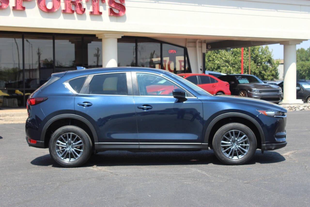 2019 Blue Mazda CX-5 Touring AWD (JM3KFBCMXK1) with an 2.5L I4 2.5L I4 engine, Automatic 6-Speed transmission, located at 4301 NW 39th , Oklahoma City, OK, 73112, (405) 949-5600, 35.512135, -97.598671 - NO DRIVERS LICENCE NO-FULL COVERAGE INSURANCE-NO CREDIT CHECK. COME ON OVER TO SUPERSPORTS AND TAKE A LOOK AND TEST DRIVE. PLEASE GIVE US A CALL AT (405) 949-5600. NO LICENSIA DE MANEJAR- NO SEGURO DE COBERTURA TOTAL- NO VERIFICACCION DE CREDITO. POR FAVOR VENGAN A SUPERSPORTS, ECHE UN - Photo#2