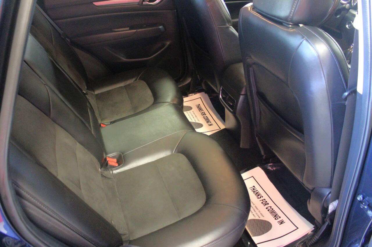 2019 Blue Mazda CX-5 Touring AWD (JM3KFBCMXK1) with an 2.5L I4 2.5L I4 engine, Automatic 6-Speed transmission, located at 4301 NW 39th , Oklahoma City, OK, 73112, (405) 949-5600, 35.512135, -97.598671 - NO DRIVERS LICENCE NO-FULL COVERAGE INSURANCE-NO CREDIT CHECK. COME ON OVER TO SUPERSPORTS AND TAKE A LOOK AND TEST DRIVE. PLEASE GIVE US A CALL AT (405) 949-5600. NO LICENSIA DE MANEJAR- NO SEGURO DE COBERTURA TOTAL- NO VERIFICACCION DE CREDITO. POR FAVOR VENGAN A SUPERSPORTS, ECHE UN - Photo#10