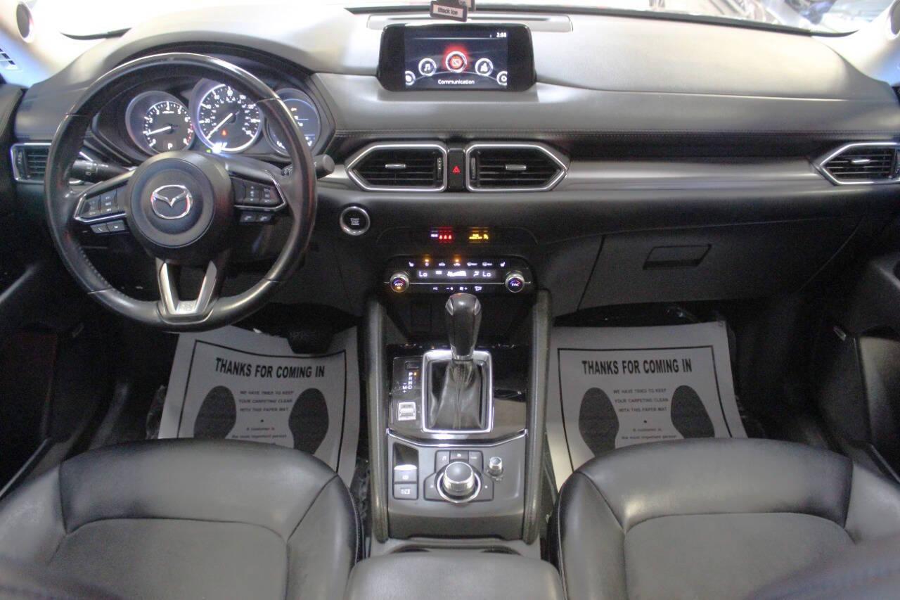 2019 Blue Mazda CX-5 Touring AWD (JM3KFBCMXK1) with an 2.5L I4 2.5L I4 engine, Automatic 6-Speed transmission, located at 4301 NW 39th , Oklahoma City, OK, 73112, (405) 949-5600, 35.512135, -97.598671 - NO DRIVERS LICENCE NO-FULL COVERAGE INSURANCE-NO CREDIT CHECK. COME ON OVER TO SUPERSPORTS AND TAKE A LOOK AND TEST DRIVE. PLEASE GIVE US A CALL AT (405) 949-5600. NO LICENSIA DE MANEJAR- NO SEGURO DE COBERTURA TOTAL- NO VERIFICACCION DE CREDITO. POR FAVOR VENGAN A SUPERSPORTS, ECHE UN - Photo#18