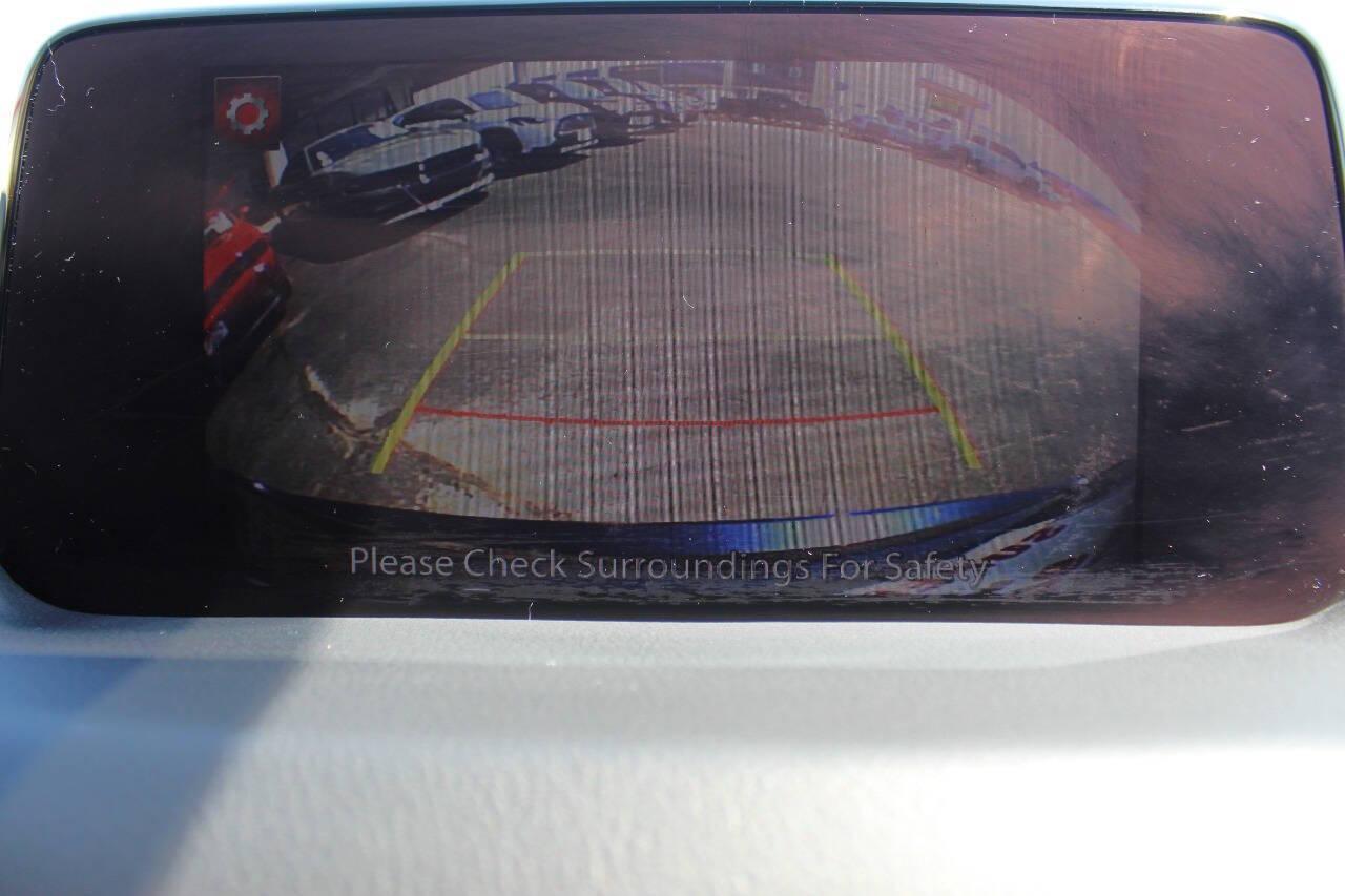 2019 Blue Mazda CX-5 Touring AWD (JM3KFBCMXK1) with an 2.5L I4 2.5L I4 engine, Automatic 6-Speed transmission, located at 4301 NW 39th , Oklahoma City, OK, 73112, (405) 949-5600, 35.512135, -97.598671 - NO DRIVERS LICENCE NO-FULL COVERAGE INSURANCE-NO CREDIT CHECK. COME ON OVER TO SUPERSPORTS AND TAKE A LOOK AND TEST DRIVE. PLEASE GIVE US A CALL AT (405) 949-5600. NO LICENSIA DE MANEJAR- NO SEGURO DE COBERTURA TOTAL- NO VERIFICACCION DE CREDITO. POR FAVOR VENGAN A SUPERSPORTS, ECHE UN - Photo#20