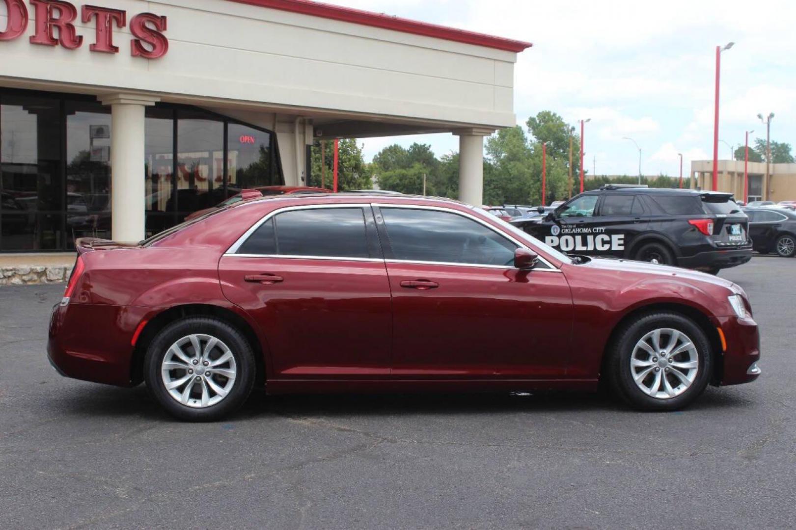 2016 Burgundy Chrysler 300 Limited RWD (2C3CCAAG4GH) with an 3.6L V6 SOHC 24V engine, 8A transmission, located at 4301 NW 39th , Oklahoma City, OK, 73112, (405) 949-5600, 35.512135, -97.598671 - Photo#2
