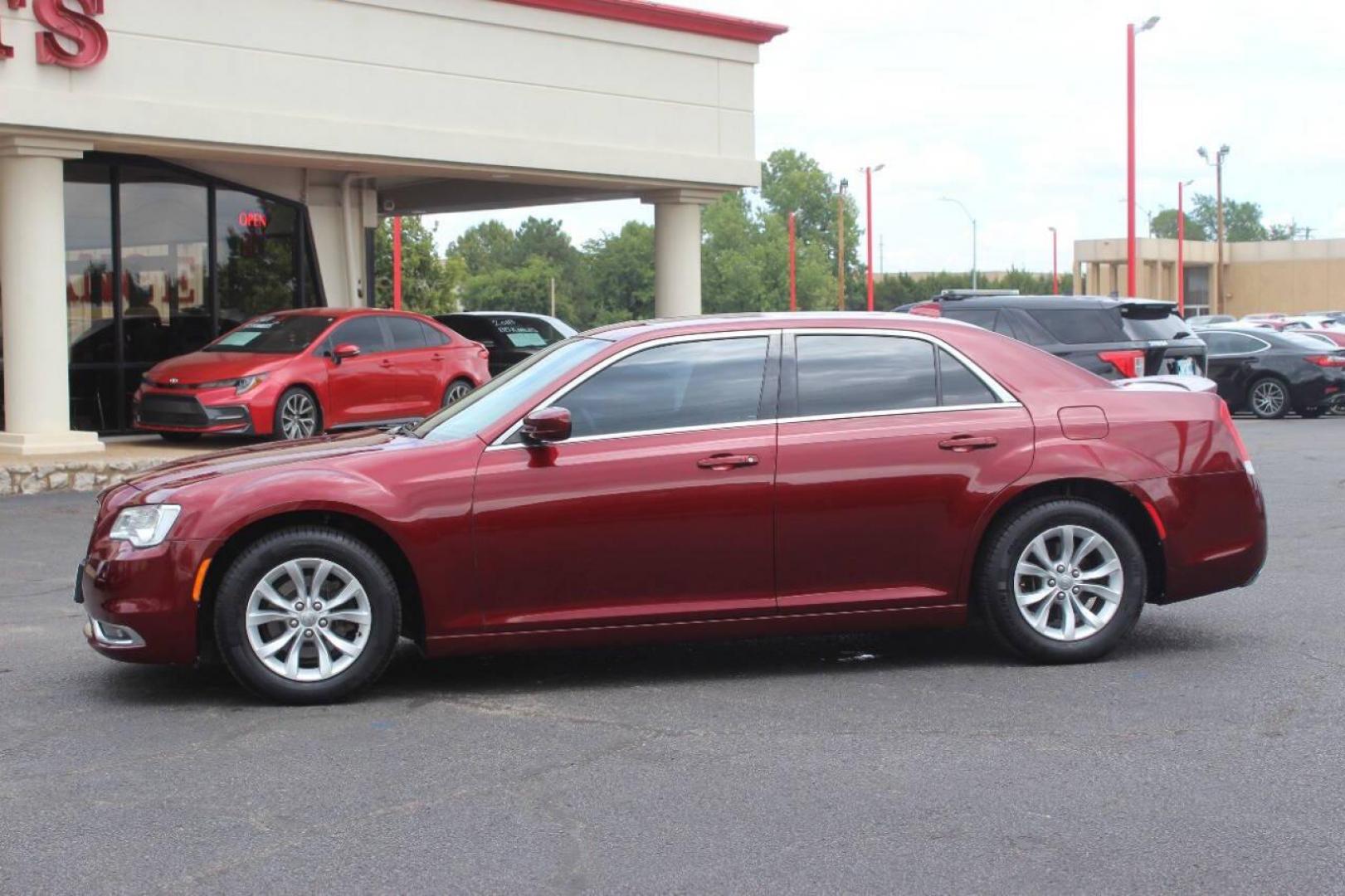 2016 Burgundy Chrysler 300 Limited RWD (2C3CCAAG4GH) with an 3.6L V6 SOHC 24V engine, 8A transmission, located at 4301 NW 39th , Oklahoma City, OK, 73112, (405) 949-5600, 35.512135, -97.598671 - Photo#5