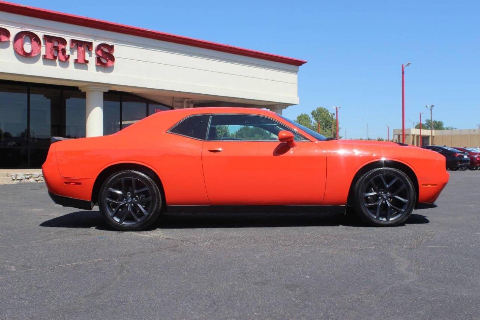 2021 Orange Dodge Challenger SXT (2C3CDZAG1MH) with an 3.6L V6 DOHC 24V engine, 8A transmission, located at 4301 NW 39th , Oklahoma City, OK, 73112, (405) 949-5600, 35.512135, -97.598671 - NO DRIVERS LICENCE NO-FULL COVERAGE INSURANCE-NO CREDIT CHECK. COME ON OVER TO SUPERSPORTS AND TAKE A LOOK AND TEST DRIVE. PLEASE GIVE US A CALL AT (405) 949-5600. NO LICENSIA DE MANEJAR- NO SEGURO DE COBERTURA TOTAL- NO VERIFICACCION DE CREDITO. POR FAVOR VENGAN A SUPERSPORTS, ECHE UN - Photo#3