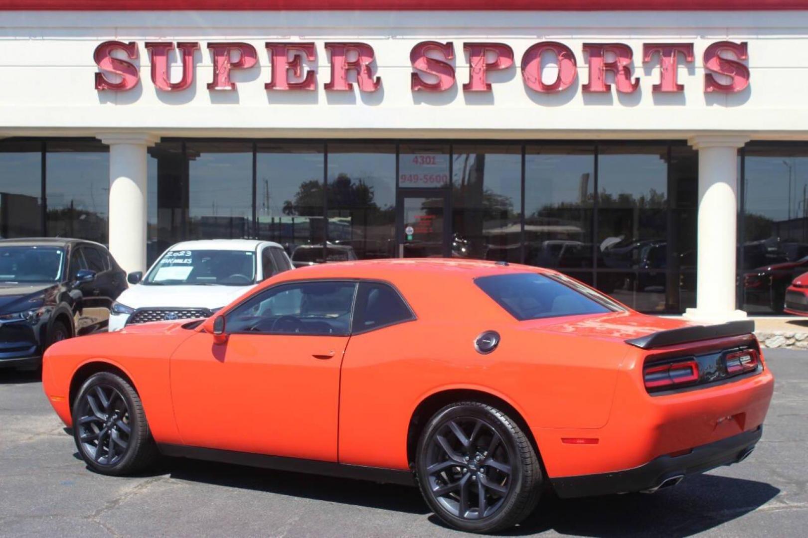 2021 Orange Dodge Challenger SXT (2C3CDZAG1MH) with an 3.6L V6 DOHC 24V engine, 8A transmission, located at 4301 NW 39th , Oklahoma City, OK, 73112, (405) 949-5600, 35.512135, -97.598671 - NO DRIVERS LICENCE NO-FULL COVERAGE INSURANCE-NO CREDIT CHECK. COME ON OVER TO SUPERSPORTS AND TAKE A LOOK AND TEST DRIVE. PLEASE GIVE US A CALL AT (405) 949-5600. NO LICENSIA DE MANEJAR- NO SEGURO DE COBERTURA TOTAL- NO VERIFICACCION DE CREDITO. POR FAVOR VENGAN A SUPERSPORTS, ECHE UN - Photo#5