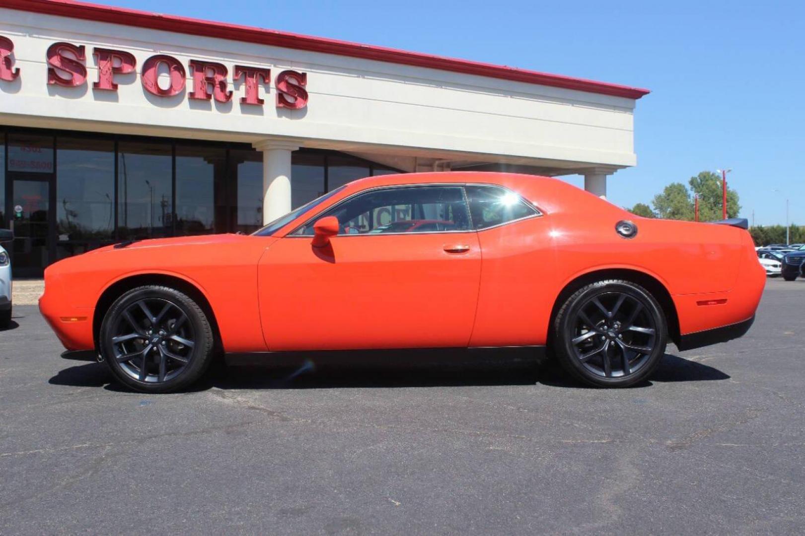 2021 Orange Dodge Challenger SXT (2C3CDZAG1MH) with an 3.6L V6 DOHC 24V engine, 8A transmission, located at 4301 NW 39th , Oklahoma City, OK, 73112, (405) 949-5600, 35.512135, -97.598671 - NO DRIVERS LICENCE NO-FULL COVERAGE INSURANCE-NO CREDIT CHECK. COME ON OVER TO SUPERSPORTS AND TAKE A LOOK AND TEST DRIVE. PLEASE GIVE US A CALL AT (405) 949-5600. NO LICENSIA DE MANEJAR- NO SEGURO DE COBERTURA TOTAL- NO VERIFICACCION DE CREDITO. POR FAVOR VENGAN A SUPERSPORTS, ECHE UN - Photo#6
