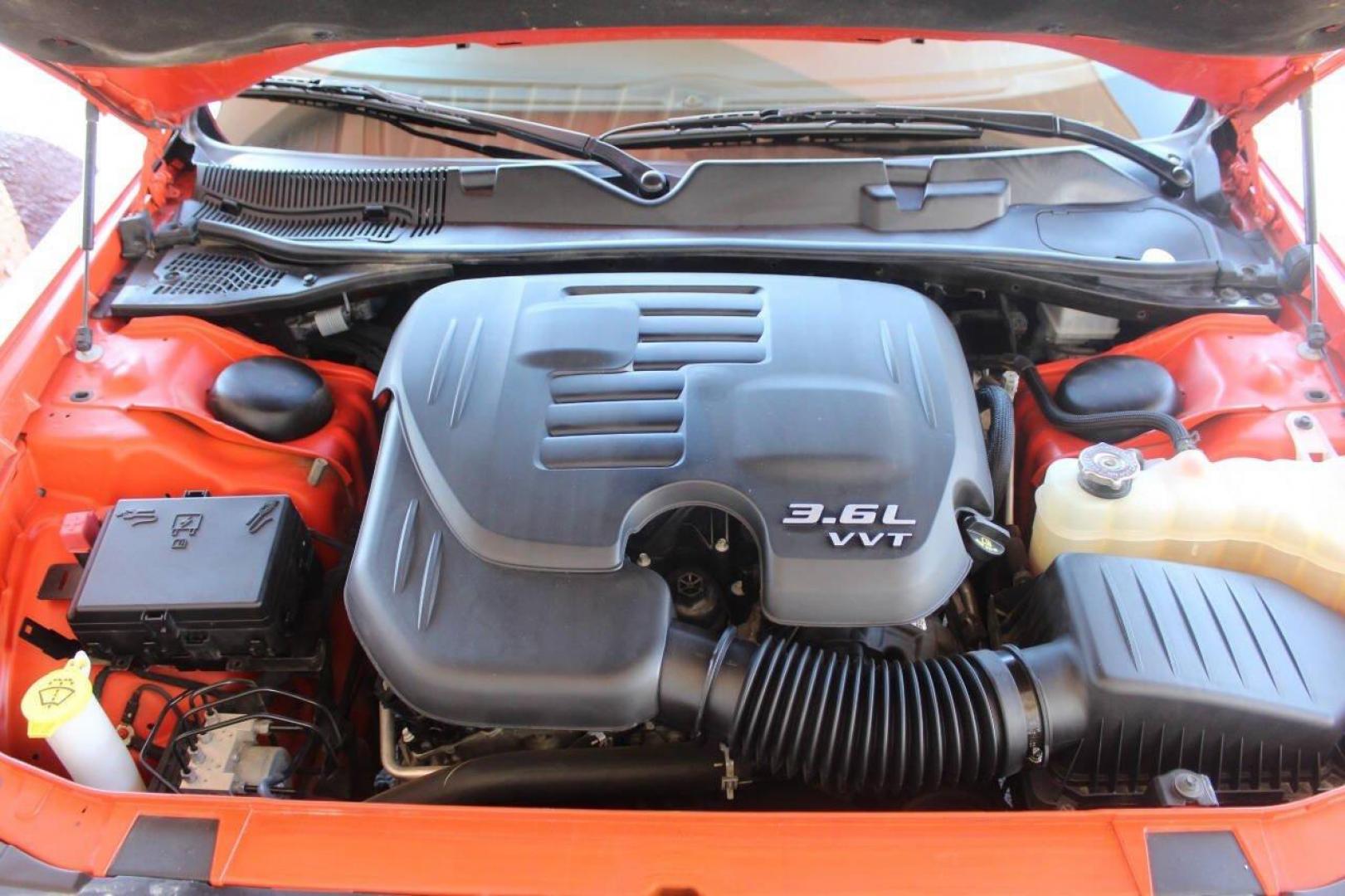 2021 Orange Dodge Challenger SXT (2C3CDZAG1MH) with an 3.6L V6 DOHC 24V engine, 8A transmission, located at 4301 NW 39th , Oklahoma City, OK, 73112, (405) 949-5600, 35.512135, -97.598671 - NO DRIVERS LICENCE NO-FULL COVERAGE INSURANCE-NO CREDIT CHECK. COME ON OVER TO SUPERSPORTS AND TAKE A LOOK AND TEST DRIVE. PLEASE GIVE US A CALL AT (405) 949-5600. NO LICENSIA DE MANEJAR- NO SEGURO DE COBERTURA TOTAL- NO VERIFICACCION DE CREDITO. POR FAVOR VENGAN A SUPERSPORTS, ECHE UN - Photo#8