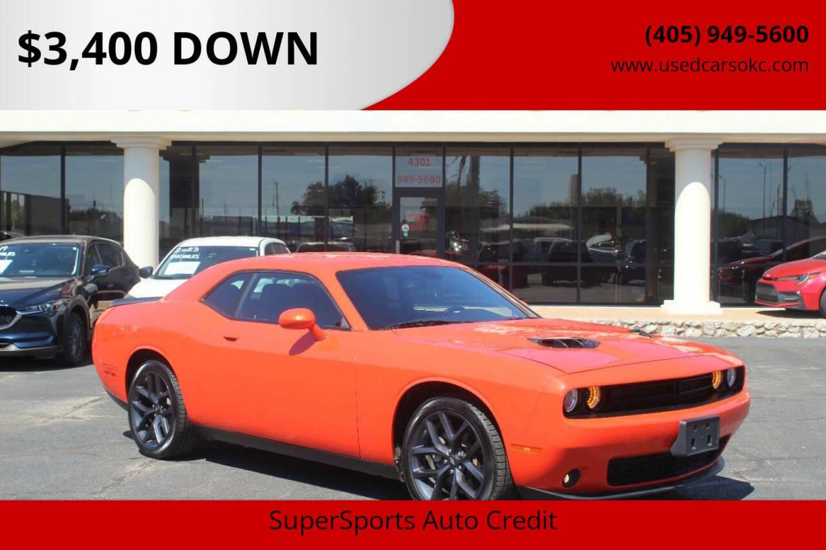 2021 Orange Dodge Challenger SXT (2C3CDZAG1MH) with an 3.6L V6 DOHC 24V engine, 8A transmission, located at 4301 NW 39th , Oklahoma City, OK, 73112, (405) 949-5600, 35.512135, -97.598671 - NO DRIVERS LICENCE NO-FULL COVERAGE INSURANCE-NO CREDIT CHECK. COME ON OVER TO SUPERSPORTS AND TAKE A LOOK AND TEST DRIVE. PLEASE GIVE US A CALL AT (405) 949-5600. NO LICENSIA DE MANEJAR- NO SEGURO DE COBERTURA TOTAL- NO VERIFICACCION DE CREDITO. POR FAVOR VENGAN A SUPERSPORTS, ECHE UN - Photo#0