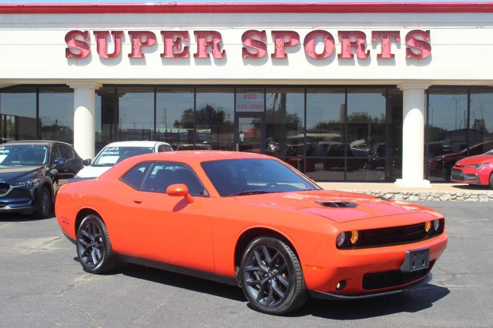 2021 Orange Dodge Challenger SXT (2C3CDZAG1MH) with an 3.6L V6 DOHC 24V engine, 8A transmission, located at 4301 NW 39th , Oklahoma City, OK, 73112, (405) 949-5600, 35.512135, -97.598671 - NO DRIVERS LICENCE NO-FULL COVERAGE INSURANCE-NO CREDIT CHECK. COME ON OVER TO SUPERSPORTS AND TAKE A LOOK AND TEST DRIVE. PLEASE GIVE US A CALL AT (405) 949-5600. NO LICENSIA DE MANEJAR- NO SEGURO DE COBERTURA TOTAL- NO VERIFICACCION DE CREDITO. POR FAVOR VENGAN A SUPERSPORTS, ECHE UN - Photo#2