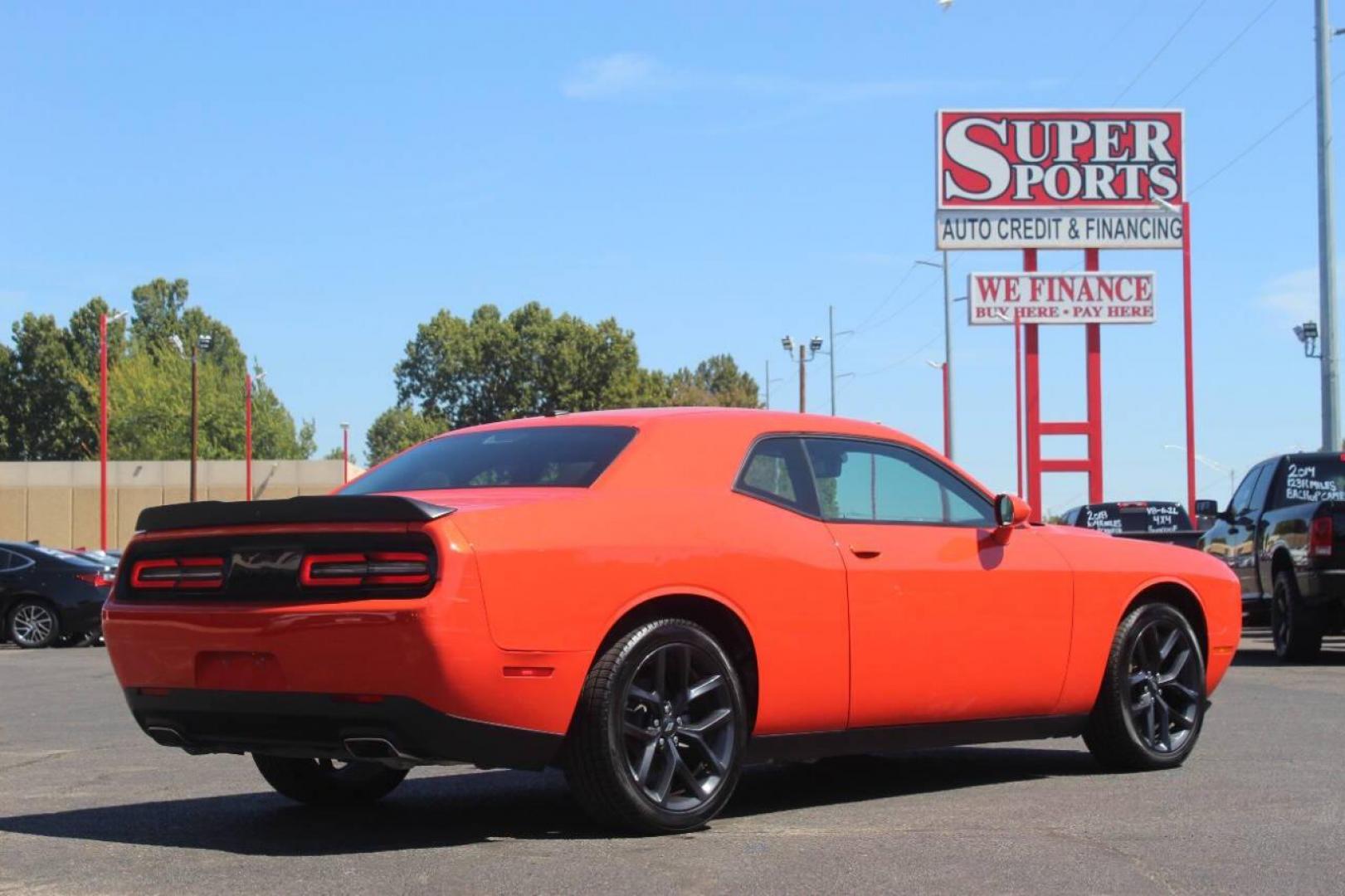 2021 Orange Dodge Challenger SXT (2C3CDZAG1MH) with an 3.6L V6 DOHC 24V engine, 8A transmission, located at 4301 NW 39th , Oklahoma City, OK, 73112, (405) 949-5600, 35.512135, -97.598671 - NO DRIVERS LICENCE NO-FULL COVERAGE INSURANCE-NO CREDIT CHECK. COME ON OVER TO SUPERSPORTS AND TAKE A LOOK AND TEST DRIVE. PLEASE GIVE US A CALL AT (405) 949-5600. NO LICENSIA DE MANEJAR- NO SEGURO DE COBERTURA TOTAL- NO VERIFICACCION DE CREDITO. POR FAVOR VENGAN A SUPERSPORTS, ECHE UN - Photo#5
