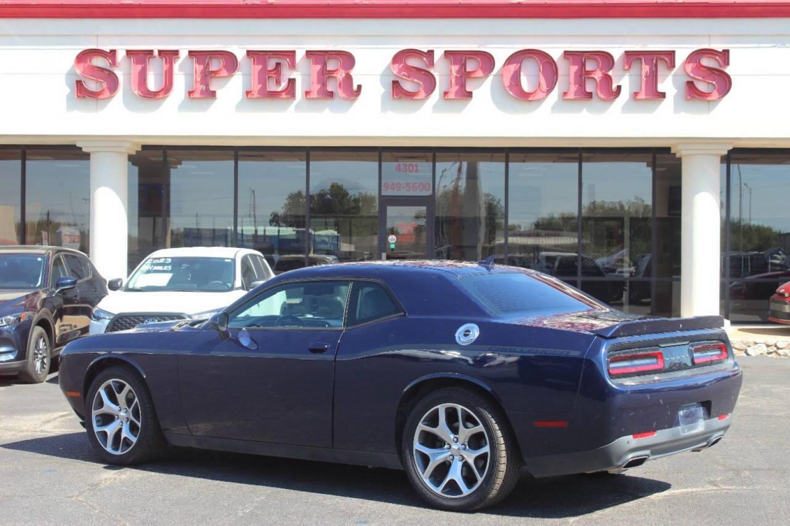2015 Blue Dodge Challenger SXT Plus (2C3CDZBG9FH) with an 3.6L V6 DOHC 24V engine, 5-Speed Automatic transmission, located at 4301 NW 39th , Oklahoma City, OK, 73112, (405) 949-5600, 35.512135, -97.598671 - MUST SEE. NO DRIVERS LICENCE NO-FULL COVERAGE INSURANCE-NO CREDIT CHECK. COME ON OVER TO SUPERSPORTS AND TAKE A LOOK AND TEST DRIVE. PLEASE GIVE US A CALL AT (405) 949-5600. NO LICENSIA DE MANEJAR- NO SEGURO DE COBERTURA TOTAL- NO VERIFICACCION DE CREDITO. POR FAVOR VENGAN A SUPERS - Photo#4