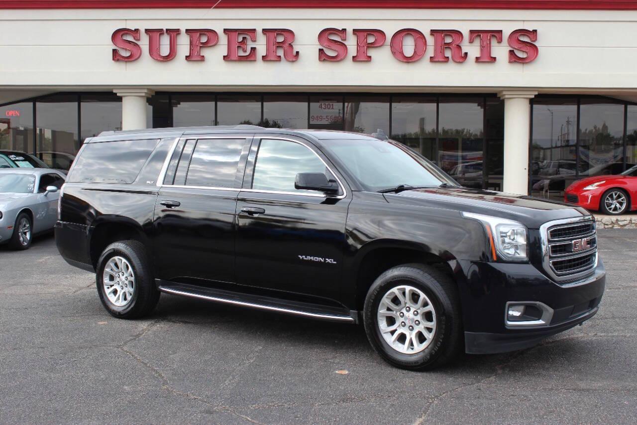 2019 Black GMC Yukon XL SLT 4WD (1GKS2GKCXKR) with an 5.3L V8 OHV 16V engine, 6A transmission, located at 4301 NW 39th , Oklahoma City, OK, 73112, (405) 949-5600, 35.512135, -97.598671 - NO DRIVERS LICENCE -NO FULL COVERAGE INSURANCE - NO CREDIT CHECK. COME ON OVER TO SUPERSPORTS, TAKE A LOOK AND TEST DRIVE. PLEASE GIVE US A CALL AT (405) 949-5600. NO LICENCIA DE CONDUCIR - NO SEGURO DE COBERTURA TOTAL - NO VERIFICACION DE CREDITO. VISITENOS EN SUPERSPORTS, MIRE NUESTRO - Photo#0