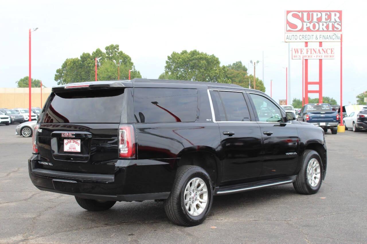 2019 Black GMC Yukon XL SLT 4WD (1GKS2GKCXKR) with an 5.3L V8 OHV 16V engine, 6A transmission, located at 4301 NW 39th , Oklahoma City, OK, 73112, (405) 949-5600, 35.512135, -97.598671 - NO DRIVERS LICENCE -NO FULL COVERAGE INSURANCE - NO CREDIT CHECK. COME ON OVER TO SUPERSPORTS, TAKE A LOOK AND TEST DRIVE. PLEASE GIVE US A CALL AT (405) 949-5600. NO LICENCIA DE CONDUCIR - NO SEGURO DE COBERTURA TOTAL - NO VERIFICACION DE CREDITO. VISITENOS EN SUPERSPORTS, MIRE NUESTRO - Photo#3