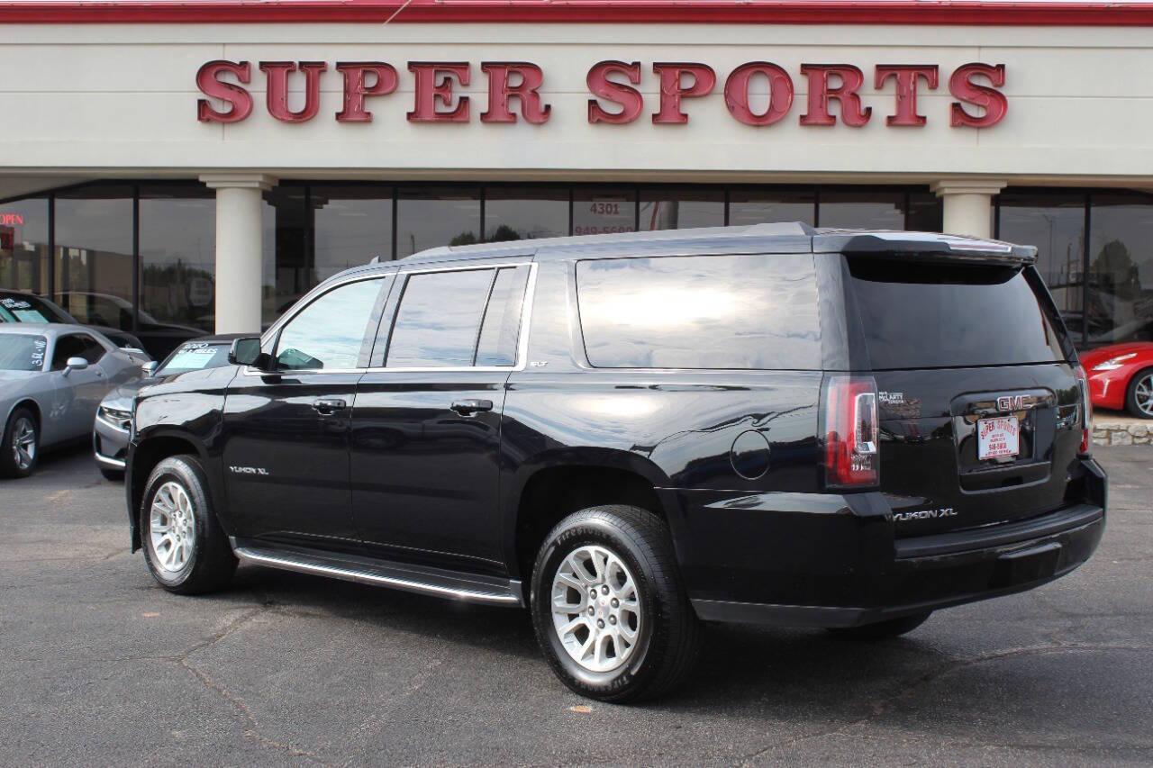 2019 Black GMC Yukon XL SLT 4WD (1GKS2GKCXKR) with an 5.3L V8 OHV 16V engine, 6A transmission, located at 4301 NW 39th , Oklahoma City, OK, 73112, (405) 949-5600, 35.512135, -97.598671 - NO DRIVERS LICENCE -NO FULL COVERAGE INSURANCE - NO CREDIT CHECK. COME ON OVER TO SUPERSPORTS, TAKE A LOOK AND TEST DRIVE. PLEASE GIVE US A CALL AT (405) 949-5600. NO LICENCIA DE CONDUCIR - NO SEGURO DE COBERTURA TOTAL - NO VERIFICACION DE CREDITO. VISITENOS EN SUPERSPORTS, MIRE NUESTRO - Photo#4