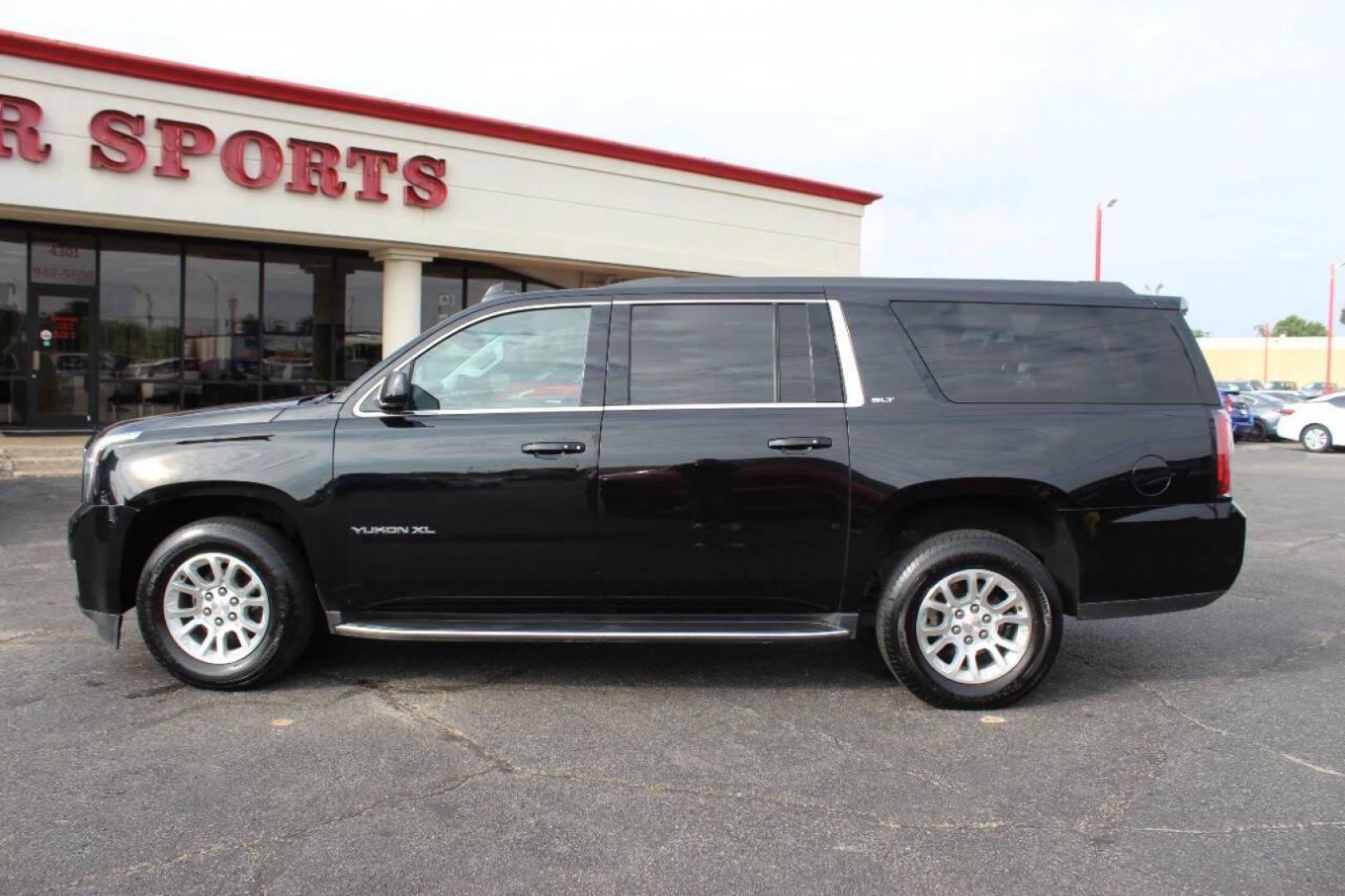 2019 Black GMC Yukon XL SLT 4WD (1GKS2GKCXKR) with an 5.3L V8 OHV 16V engine, 6A transmission, located at 4301 NW 39th , Oklahoma City, OK, 73112, (405) 949-5600, 35.512135, -97.598671 - NO DRIVERS LICENCE -NO FULL COVERAGE INSURANCE - NO CREDIT CHECK. COME ON OVER TO SUPERSPORTS, TAKE A LOOK AND TEST DRIVE. PLEASE GIVE US A CALL AT (405) 949-5600. NO LICENCIA DE CONDUCIR - NO SEGURO DE COBERTURA TOTAL - NO VERIFICACION DE CREDITO. VISITENOS EN SUPERSPORTS, MIRE NUESTRO - Photo#6