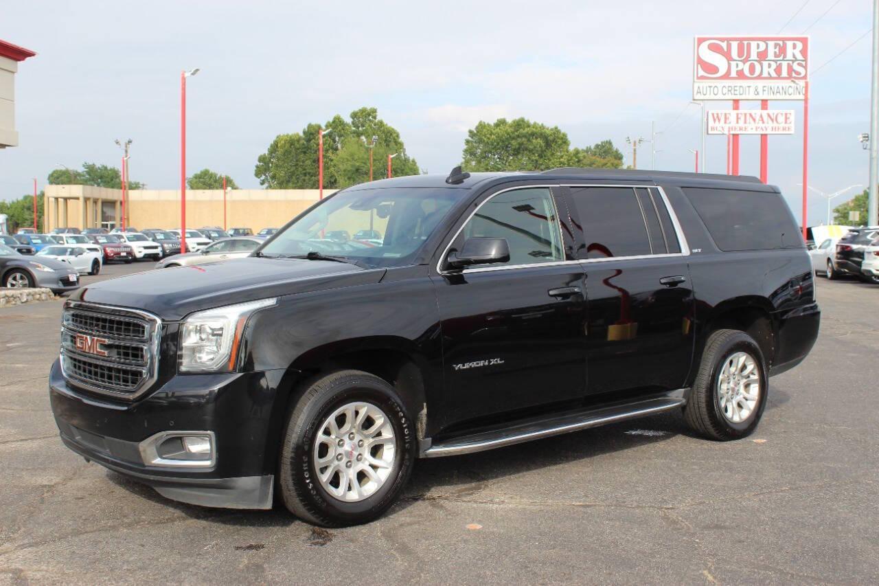 2019 Black GMC Yukon XL SLT 4WD (1GKS2GKCXKR) with an 5.3L V8 OHV 16V engine, 6A transmission, located at 4301 NW 39th , Oklahoma City, OK, 73112, (405) 949-5600, 35.512135, -97.598671 - NO DRIVERS LICENCE -NO FULL COVERAGE INSURANCE - NO CREDIT CHECK. COME ON OVER TO SUPERSPORTS, TAKE A LOOK AND TEST DRIVE. PLEASE GIVE US A CALL AT (405) 949-5600. NO LICENCIA DE CONDUCIR - NO SEGURO DE COBERTURA TOTAL - NO VERIFICACION DE CREDITO. VISITENOS EN SUPERSPORTS, MIRE NUESTRO - Photo#6