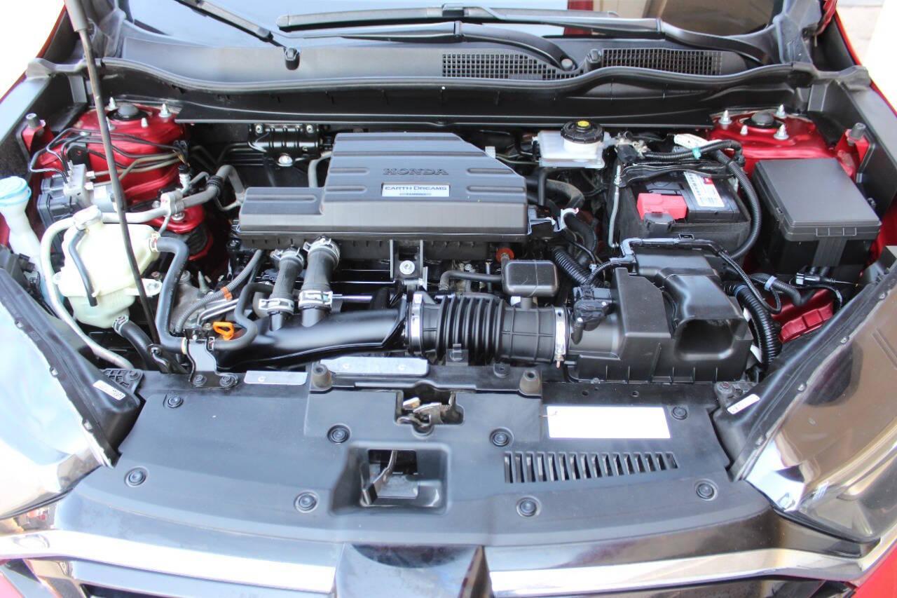 2021 Red Honda CR-V EX AWD (2HKRW2H59MH) with an 1.5L I4 Turbocharger 1.5L I4 engine, CVT transmission, located at 4301 NW 39th , Oklahoma City, OK, 73112, (405) 949-5600, 35.512135, -97.598671 - NO DRIVERS LICENCE -NO FULL COVERAGE INSURANCE - NO CREDIT CHECK. COME ON OVER TO SUPERSPORTS, TAKE A LOOK AND TEST DRIVE. PLEASE GIVE US A CALL AT (405) 949-5600. NO LICENCIA DE CONDUCIR - NO SEGURO DE COBERTURA TOTAL - NO VERIFICACION DE CREDITO. VISITENOS EN SUPERSPORTS, MIRE NUESTRO - Photo#7