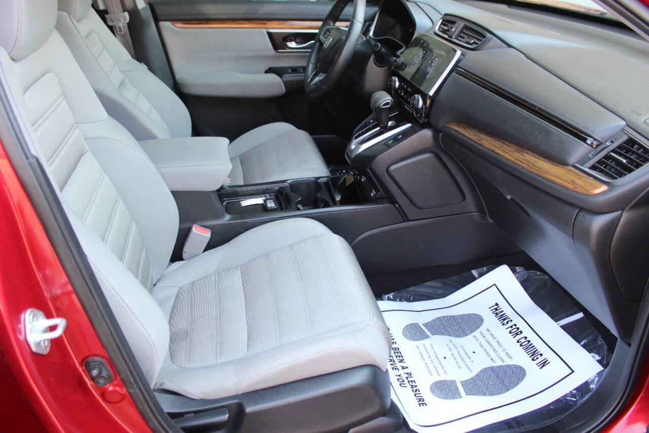 2021 Red Honda CR-V EX AWD (2HKRW2H59MH) with an 1.5L I4 Turbocharger 1.5L I4 engine, CVT transmission, located at 4301 NW 39th , Oklahoma City, OK, 73112, (405) 949-5600, 35.512135, -97.598671 - NO DRIVERS LICENCE -NO FULL COVERAGE INSURANCE - NO CREDIT CHECK. COME ON OVER TO SUPERSPORTS, TAKE A LOOK AND TEST DRIVE. PLEASE GIVE US A CALL AT (405) 949-5600. NO LICENCIA DE CONDUCIR - NO SEGURO DE COBERTURA TOTAL - NO VERIFICACION DE CREDITO. VISITENOS EN SUPERSPORTS, MIRE NUESTRO - Photo#8