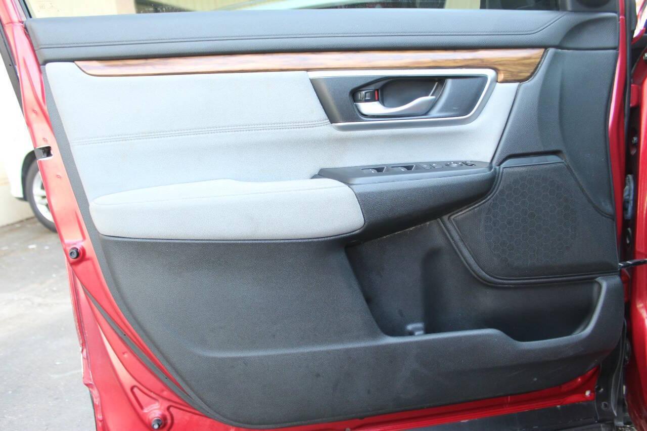 2021 Red Honda CR-V EX AWD (2HKRW2H59MH) with an 1.5L I4 Turbocharger 1.5L I4 engine, CVT transmission, located at 4301 NW 39th , Oklahoma City, OK, 73112, (405) 949-5600, 35.512135, -97.598671 - NO DRIVERS LICENCE -NO FULL COVERAGE INSURANCE - NO CREDIT CHECK. COME ON OVER TO SUPERSPORTS, TAKE A LOOK AND TEST DRIVE. PLEASE GIVE US A CALL AT (405) 949-5600. NO LICENCIA DE CONDUCIR - NO SEGURO DE COBERTURA TOTAL - NO VERIFICACION DE CREDITO. VISITENOS EN SUPERSPORTS, MIRE NUESTRO - Photo#17