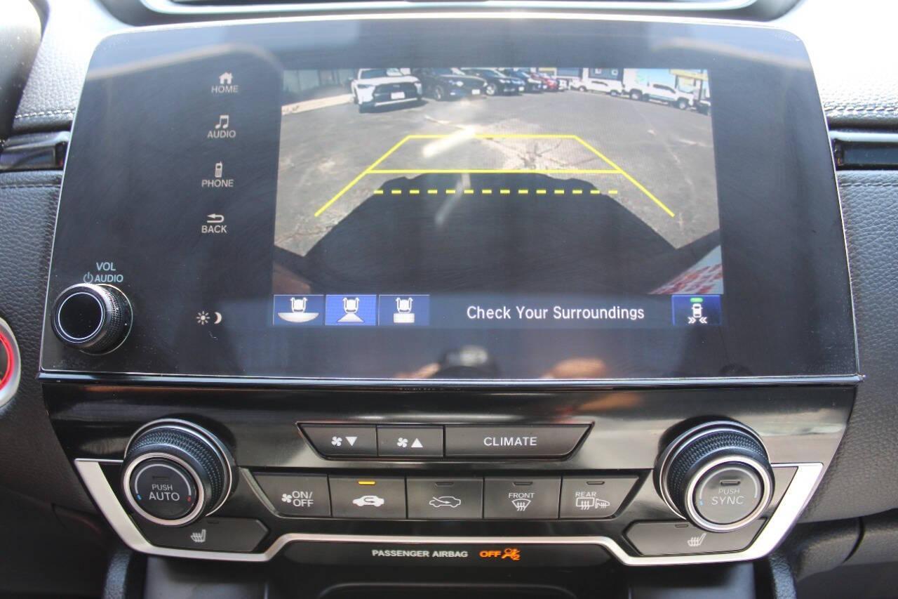 2021 Red Honda CR-V EX AWD (2HKRW2H59MH) with an 1.5L I4 Turbocharger 1.5L I4 engine, CVT transmission, located at 4301 NW 39th , Oklahoma City, OK, 73112, (405) 949-5600, 35.512135, -97.598671 - NO DRIVERS LICENCE -NO FULL COVERAGE INSURANCE - NO CREDIT CHECK. COME ON OVER TO SUPERSPORTS, TAKE A LOOK AND TEST DRIVE. PLEASE GIVE US A CALL AT (405) 949-5600. NO LICENCIA DE CONDUCIR - NO SEGURO DE COBERTURA TOTAL - NO VERIFICACION DE CREDITO. VISITENOS EN SUPERSPORTS, MIRE NUESTRO - Photo#20