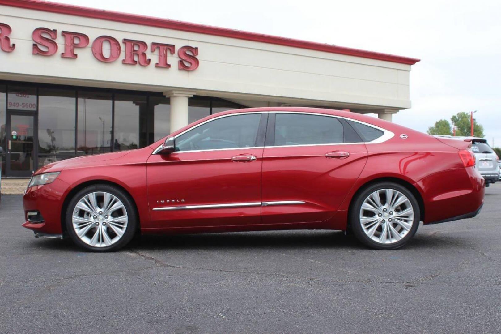 2014 Red Chevrolet Impala 2LZ (1G1155S36EU) with an 3.6L V6 DOHC 24VV FFV engine, 6-Speed Automatic transmission, located at 4301 NW 39th , Oklahoma City, OK, 73112, (405) 949-5600, 35.512135, -97.598671 - Photo#5