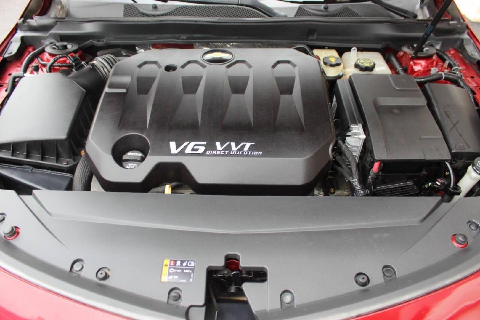 2014 Red Chevrolet Impala 2LZ (1G1155S36EU) with an 3.6L V6 DOHC 24VV FFV engine, 6-Speed Automatic transmission, located at 4301 NW 39th , Oklahoma City, OK, 73112, (405) 949-5600, 35.512135, -97.598671 - Photo#7