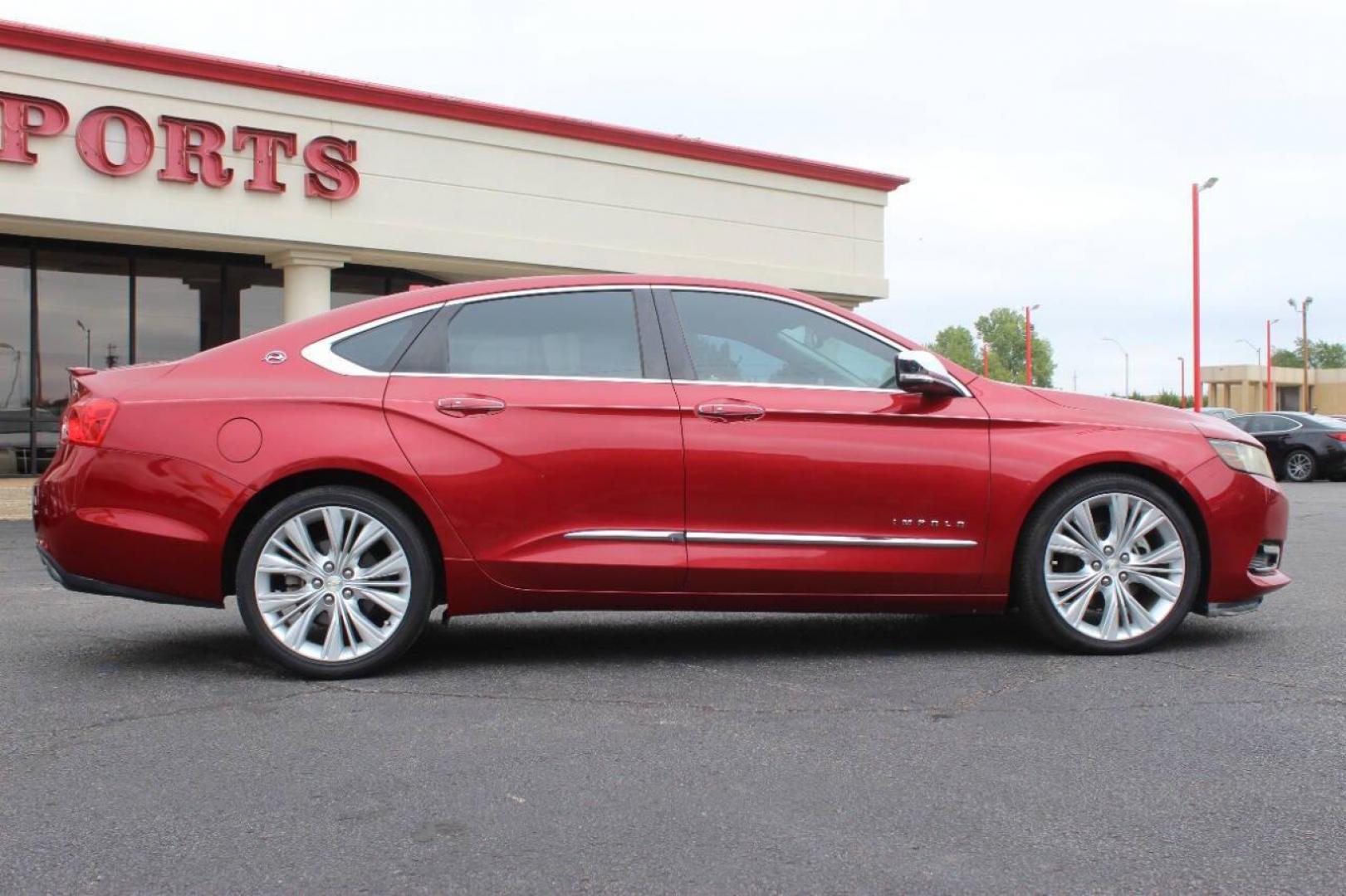 2014 Red Chevrolet Impala 2LZ (1G1155S36EU) with an 3.6L V6 DOHC 24VV FFV engine, 6-Speed Automatic transmission, located at 4301 NW 39th , Oklahoma City, OK, 73112, (405) 949-5600, 35.512135, -97.598671 - Photo#2