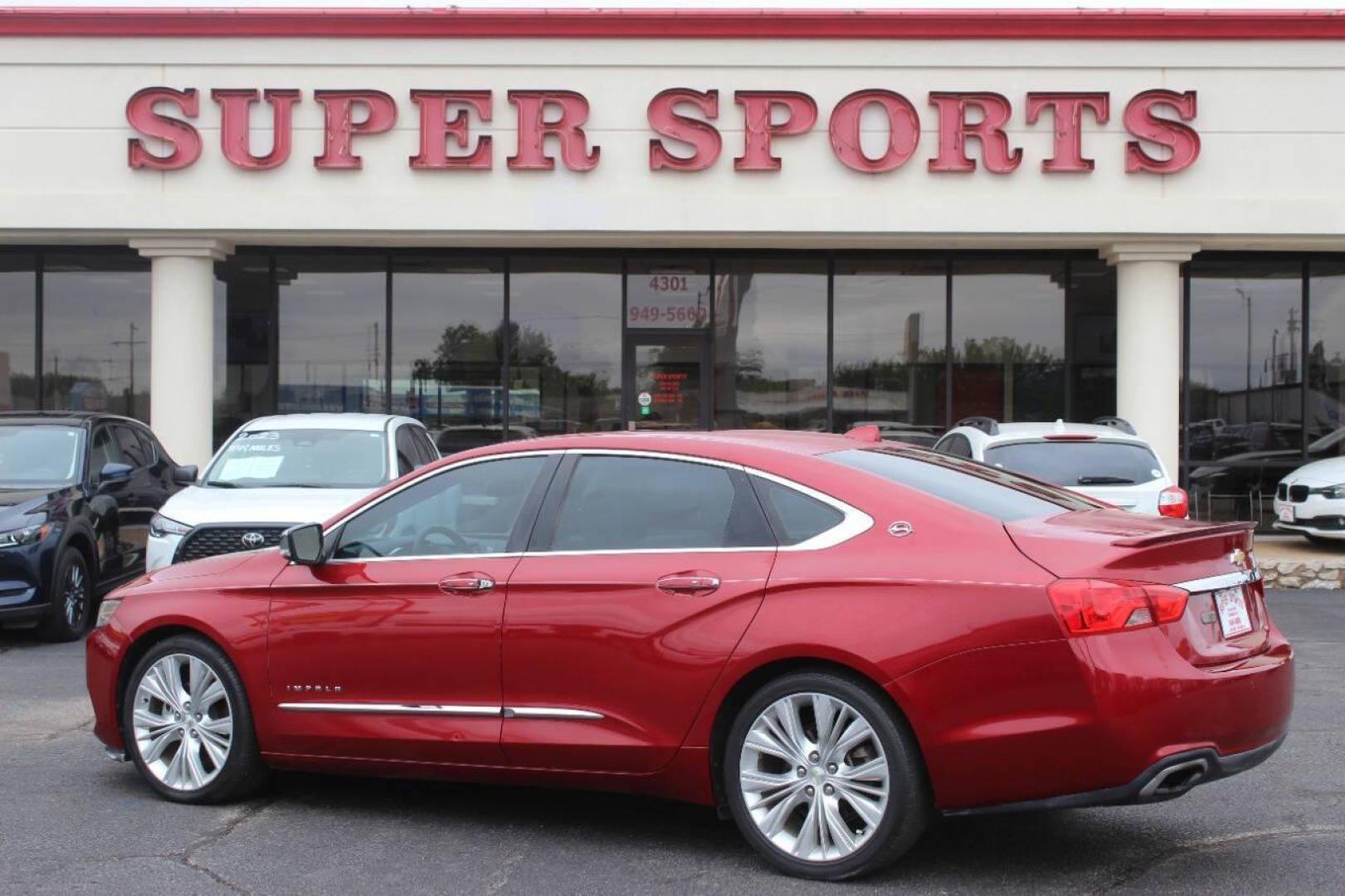 2014 Red Chevrolet Impala 2LZ (1G1155S36EU) with an 3.6L V6 DOHC 24VV FFV engine, 6-Speed Automatic transmission, located at 4301 NW 39th , Oklahoma City, OK, 73112, (405) 949-5600, 35.512135, -97.598671 - Photo#4