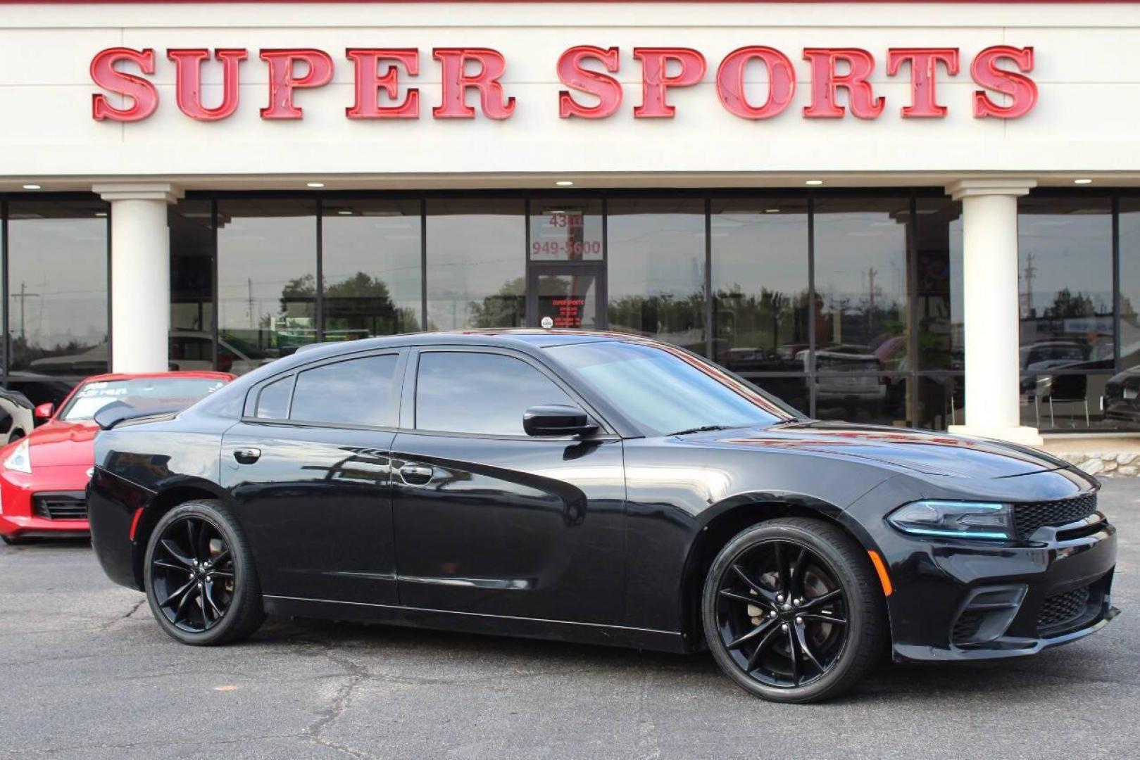 2016 Black Dodge Charger SE (2C3CDXBG0GH) with an 3.6L V6 DOHC 24V engine, 8A transmission, located at 4301 NW 39th , Oklahoma City, OK, 73112, (405) 949-5600, 35.512135, -97.598671 - NO DRIVERS LICENCE -NO FULL COVERAGE INSURANCE - NO CREDIT CHECK. COME ON OVER TO SUPERSPORTS, TAKE A LOOK AND TEST DRIVE. PLEASE GIVE US A CALL AT (405) 949-5600. NO LICENCIA DE CONDUCIR - NO SEGURO DE COBERTURA TOTAL - NO VERIFICACION DE CREDITO. VISITENOS EN SUPERSPORTS, MIRE NUESTRO - Photo#0