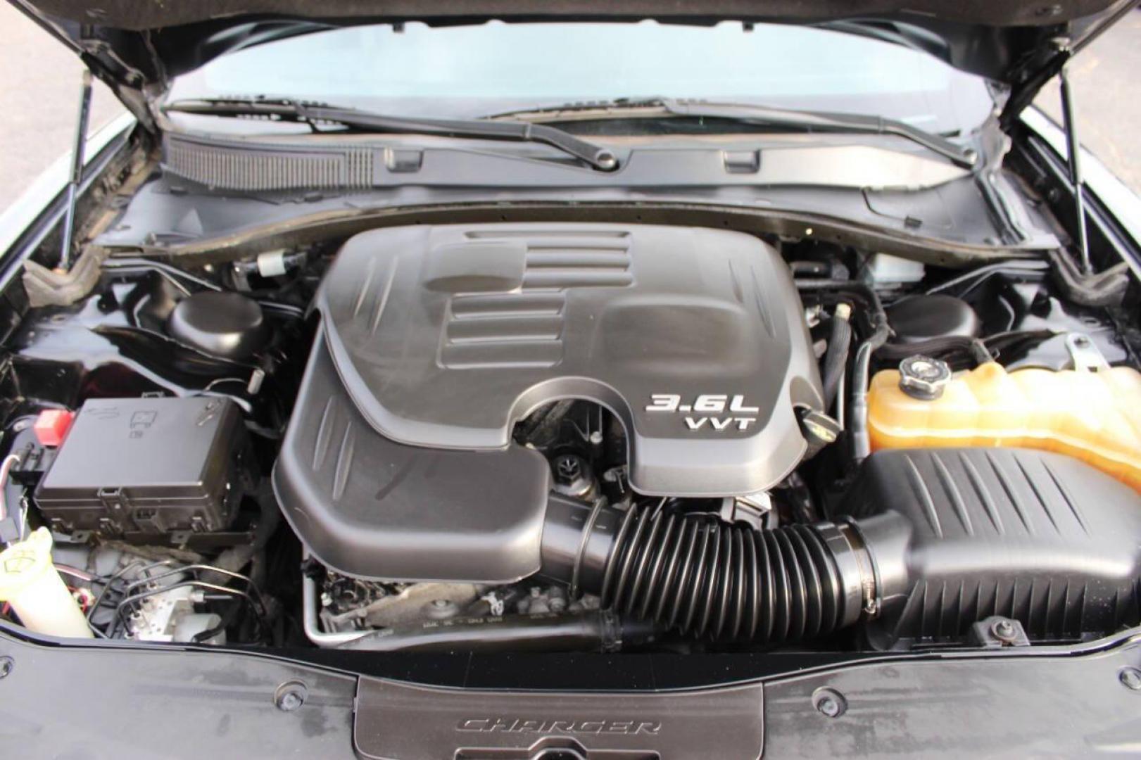 2016 Black Dodge Charger SE (2C3CDXBG0GH) with an 3.6L V6 DOHC 24V engine, 8A transmission, located at 4301 NW 39th , Oklahoma City, OK, 73112, (405) 949-5600, 35.512135, -97.598671 - NO DRIVERS LICENCE -NO FULL COVERAGE INSURANCE - NO CREDIT CHECK. COME ON OVER TO SUPERSPORTS, TAKE A LOOK AND TEST DRIVE. PLEASE GIVE US A CALL AT (405) 949-5600. NO LICENCIA DE CONDUCIR - NO SEGURO DE COBERTURA TOTAL - NO VERIFICACION DE CREDITO. VISITENOS EN SUPERSPORTS, MIRE NUESTRO - Photo#7