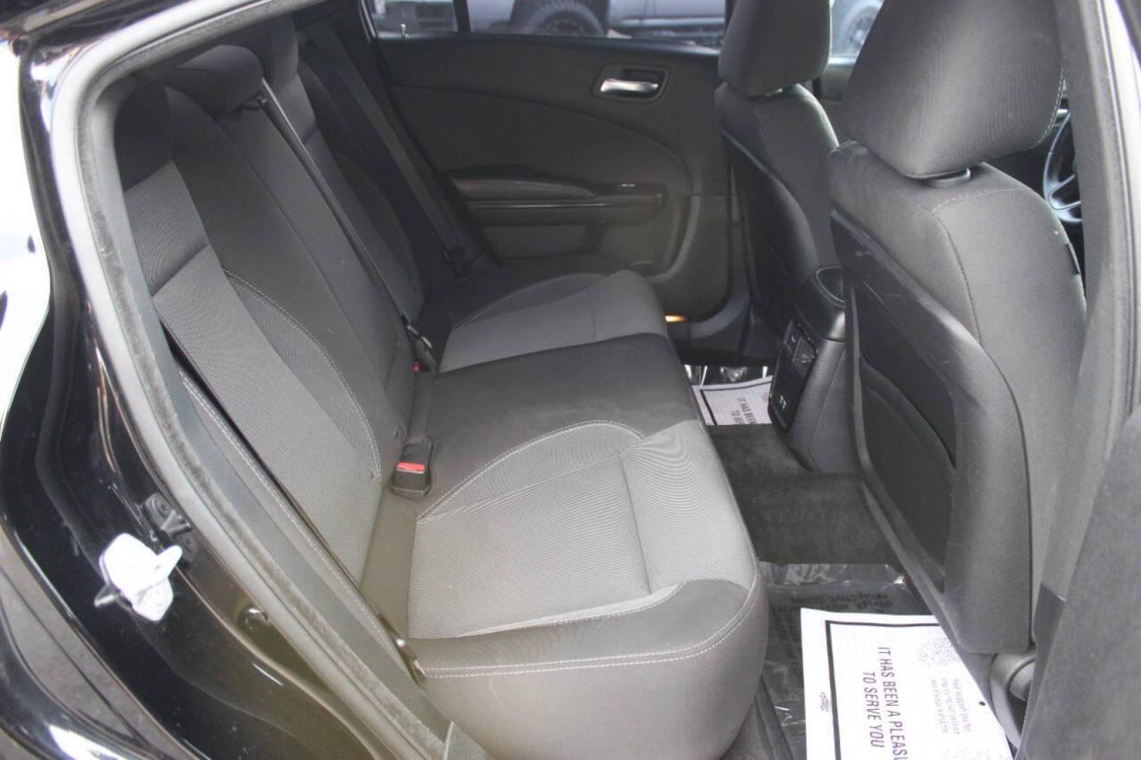 2016 Black Dodge Charger SE (2C3CDXBG0GH) with an 3.6L V6 DOHC 24V engine, 8A transmission, located at 4301 NW 39th , Oklahoma City, OK, 73112, (405) 949-5600, 35.512135, -97.598671 - NO DRIVERS LICENCE -NO FULL COVERAGE INSURANCE - NO CREDIT CHECK. COME ON OVER TO SUPERSPORTS, TAKE A LOOK AND TEST DRIVE. PLEASE GIVE US A CALL AT (405) 949-5600. NO LICENCIA DE CONDUCIR - NO SEGURO DE COBERTURA TOTAL - NO VERIFICACION DE CREDITO. VISITENOS EN SUPERSPORTS, MIRE NUESTRO - Photo#10