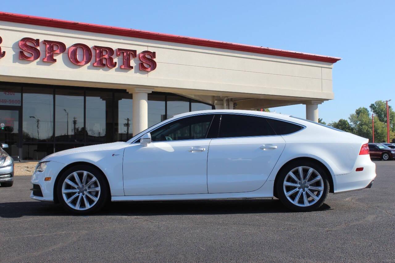 2014 White Audi A7 3.0T Premium quattro (WAU2GAFC1EN) with an 3.0L V6 Supercharger 3.0L V6 engine, Automatic 8-Speed transmission, located at 4301 NW 39th , Oklahoma City, OK, 73112, (405) 949-5600, 35.512135, -97.598671 - NO DRIVERS LICENCE NO-FULL COVERAGE INSURANCE-NO CREDIT CHECK. COME ON OVER TO SUPERSPORTS AND TAKE A LOOK AND TEST DRIVE. PLEASE GIVE US A CALL AT (405) 949-5600. NO LICENSIA DE MANEJAR- NO SEGURO DE COBERTURA TOTAL- NO VERIFICACCION DE CREDITO. POR FAVOR VENGAN A SUPERSPORTS, ECHE UN - Photo#4
