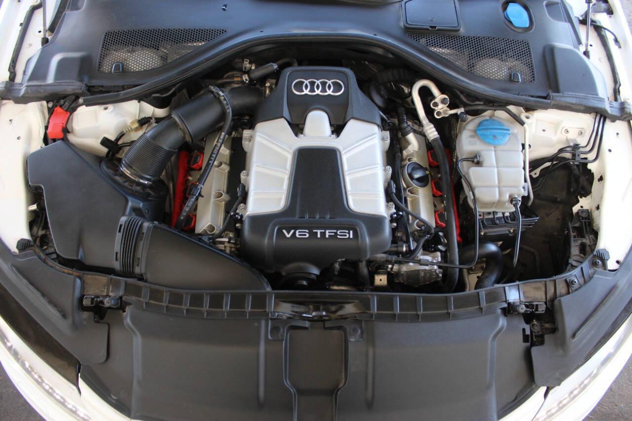 2014 White Audi A7 3.0T Premium quattro (WAU2GAFC1EN) with an 3.0L V6 Supercharger 3.0L V6 engine, Automatic 8-Speed transmission, located at 4301 NW 39th , Oklahoma City, OK, 73112, (405) 949-5600, 35.512135, -97.598671 - NO DRIVERS LICENCE NO-FULL COVERAGE INSURANCE-NO CREDIT CHECK. COME ON OVER TO SUPERSPORTS AND TAKE A LOOK AND TEST DRIVE. PLEASE GIVE US A CALL AT (405) 949-5600. NO LICENSIA DE MANEJAR- NO SEGURO DE COBERTURA TOTAL- NO VERIFICACCION DE CREDITO. POR FAVOR VENGAN A SUPERSPORTS, ECHE UN - Photo#5