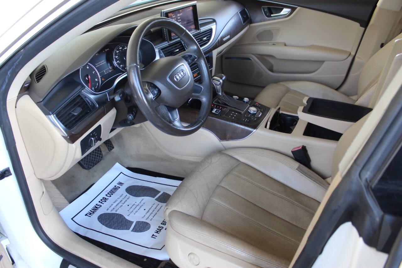 2014 White Audi A7 3.0T Premium quattro (WAU2GAFC1EN) with an 3.0L V6 Supercharger 3.0L V6 engine, Automatic 8-Speed transmission, located at 4301 NW 39th , Oklahoma City, OK, 73112, (405) 949-5600, 35.512135, -97.598671 - NO DRIVERS LICENCE NO-FULL COVERAGE INSURANCE-NO CREDIT CHECK. COME ON OVER TO SUPERSPORTS AND TAKE A LOOK AND TEST DRIVE. PLEASE GIVE US A CALL AT (405) 949-5600. NO LICENSIA DE MANEJAR- NO SEGURO DE COBERTURA TOTAL- NO VERIFICACCION DE CREDITO. POR FAVOR VENGAN A SUPERSPORTS, ECHE UN - Photo#13