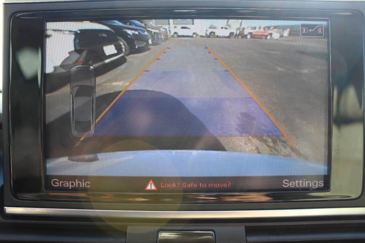 2014 White Audi A7 3.0T Premium quattro (WAU2GAFC1EN) with an 3.0L V6 Supercharger 3.0L V6 engine, Automatic 8-Speed transmission, located at 4301 NW 39th , Oklahoma City, OK, 73112, (405) 949-5600, 35.512135, -97.598671 - NO DRIVERS LICENCE NO-FULL COVERAGE INSURANCE-NO CREDIT CHECK. COME ON OVER TO SUPERSPORTS AND TAKE A LOOK AND TEST DRIVE. PLEASE GIVE US A CALL AT (405) 949-5600. NO LICENSIA DE MANEJAR- NO SEGURO DE COBERTURA TOTAL- NO VERIFICACCION DE CREDITO. POR FAVOR VENGAN A SUPERSPORTS, ECHE UN - Photo#16