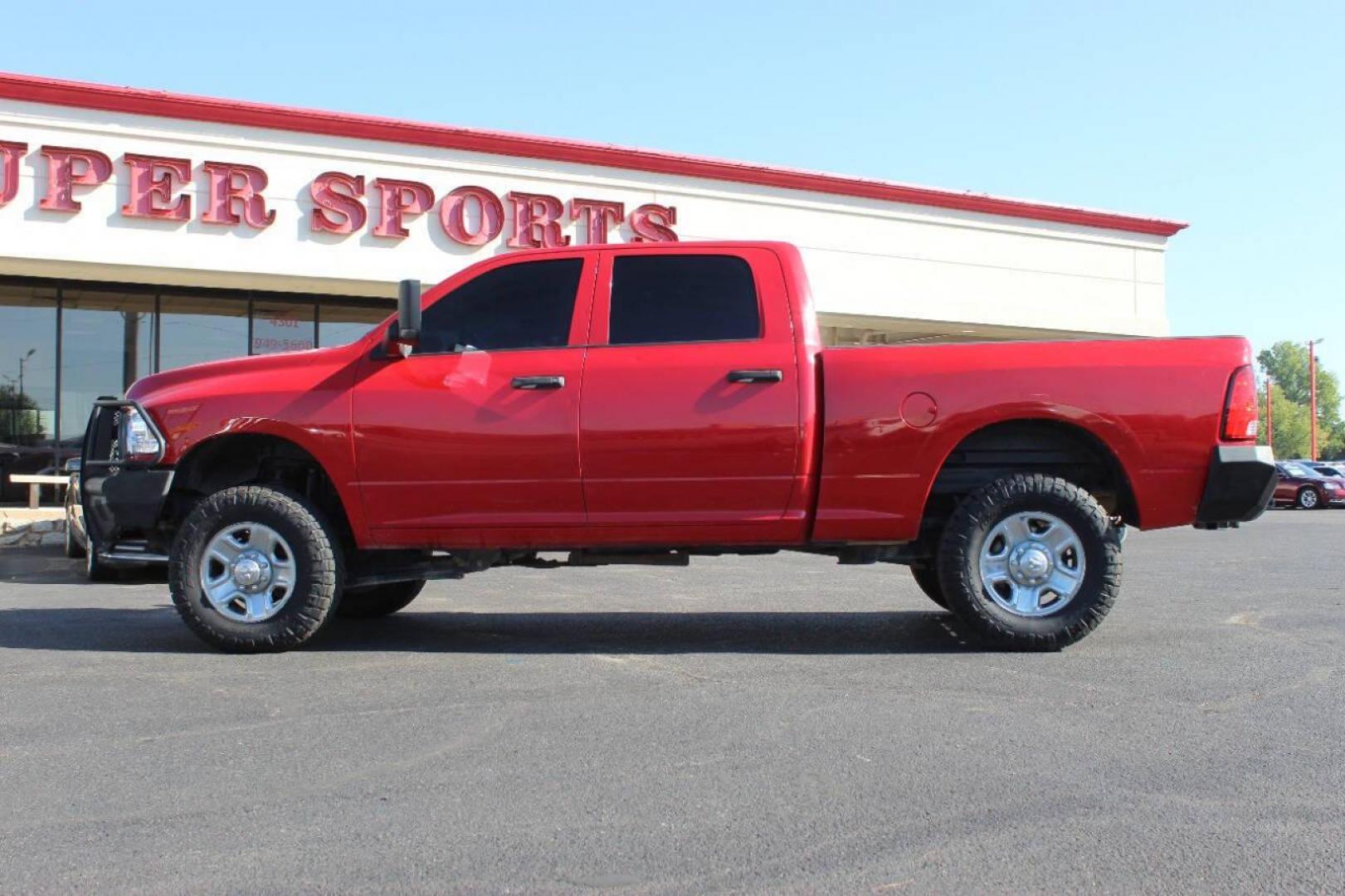 2016 Red RAM 2500 Tradesman Crew Cab SWB 4WD (3C6UR5CL6GG) with an 6.7L L6 OHV 24V TURBO DIESEL engine, 6A transmission, located at 4301 NW 39th , Oklahoma City, OK, 73112, (405) 949-5600, 35.512135, -97.598671 - NO DRIVERS LICENCE NO-FULL COVERAGE INSURANCE-NO CREDIT CHECK. COME ON OVER TO SUPERSPORTS AND TAKE A LOOK AND TEST DRIVE. PLEASE GIVE US A CALL AT (405) 949-5600. NO LICENSIA DE MANEJAR- NO SEGURO DE COBERTURA TOTAL- NO VERIFICACCION DE CREDITO. POR FAVOR VENGAN A SUPERSPORTS, ECHE UN - Photo#3