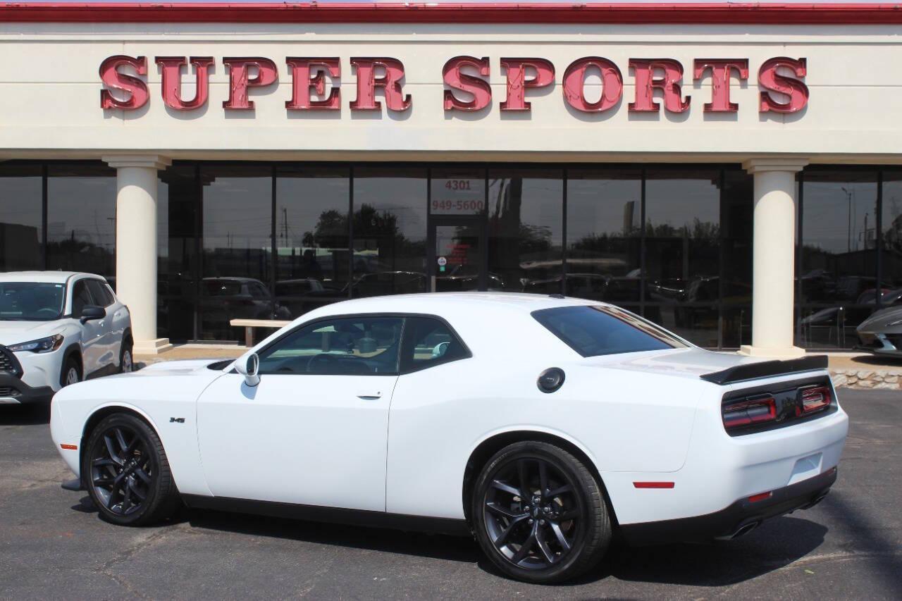 2023 White Dodge Challenger R/T Plus (2C3CDZBT7PH) with an 5.7L V8 OHV 16V engine, 6A transmission, located at 4301 NW 39th , Oklahoma City, OK, 73112, (405) 949-5600, 35.512135, -97.598671 - NO DRIVERS LICENCE -NO FULL COVERAGE INSURANCE - NO CREDIT CHECK. COME ON OVER TO SUPERSPORTS, TAKE A LOOK AND TEST DRIVE. PLEASE GIVE US A CALL AT (405) 949-5600. NO LICENCIA DE CONDUCIR - NO SEGURO DE COBERTURA TOTAL - NO VERIFICACION DE CREDITO. VISITENOS EN SUPERSPORTS, MIRE NUESTRO - Photo#4