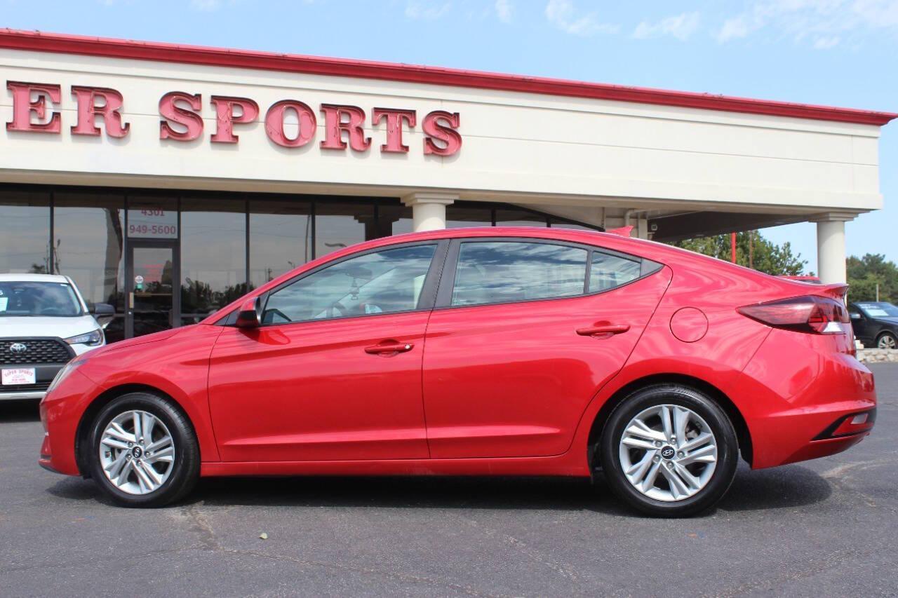 2020 Red Hyundai Elantra Limited (5NPD84LF7LH) with an 1.8L L4 DOHC 16V engine, 6A transmission, located at 4301 NW 39th , Oklahoma City, OK, 73112, (405) 949-5600, 35.512135, -97.598671 - NO DRIVERS LICENCE -NO FULL COVERAGE INSURANCE - NO CREDIT CHECK. COME ON OVER TO SUPERSPORTS, TAKE A LOOK AND TEST DRIVE. PLEASE GIVE US A CALL AT (405) 949-5600. NO LICENCIA DE CONDUCIR - NO SEGURO DE COBERTURA TOTAL - NO VERIFICACION DE CREDITO. VISITENOS EN SUPERSPORTS, MIRE NUESTRO - Photo#5
