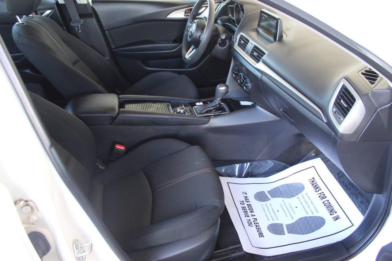 2017 White Mazda MAZDA3 i Sport AT 4-Door (3MZBN1U73HM) with an 2.0L I4 2.0L I4 engine, Automatic 6-Speed transmission, located at 4301 NW 39th , Oklahoma City, OK, 73112, (405) 949-5600, 35.512135, -97.598671 - NO DRIVERS LICENCE NO-FULL COVERAGE INSURANCE-NO CREDIT CHECK. COME ON OVER TO SUPERSPORTS AND TAKE A LOOK AND TEST DRIVE. PLEASE GIVE US A CALL AT (405) 949-5600. NO LICENSIA DE MANEJAR- NO SEGURO DE COBERTURA TOTAL- NO VERIFICACCION DE CREDITO. POR FAVOR VENGAN A SUPERSPORTS, ECHE UN - Photo#8